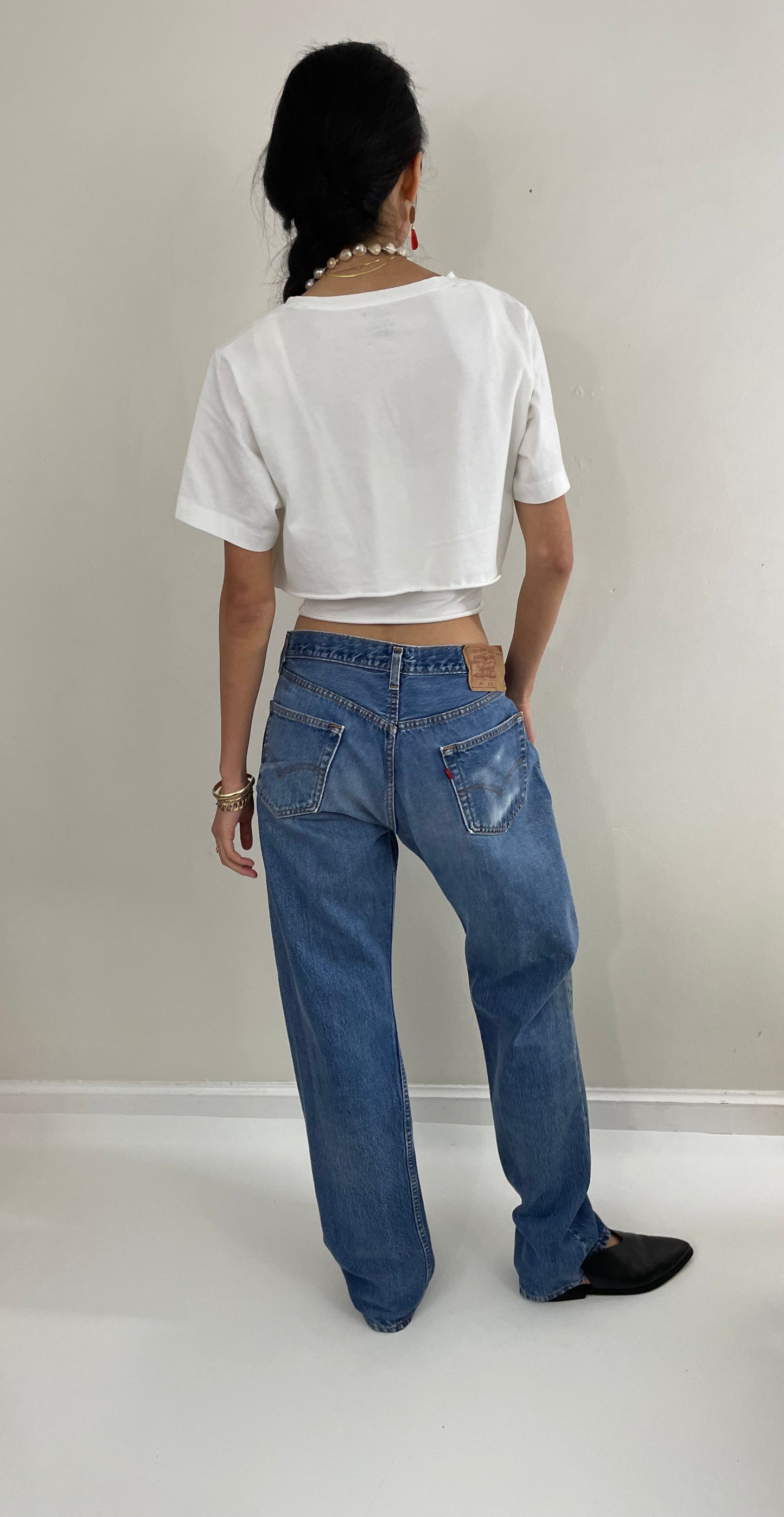 Vintage 80s Levis 501 button fly soft faded tall boyfriend baggy medium wash Levis jeans made in USA size 33 x 34