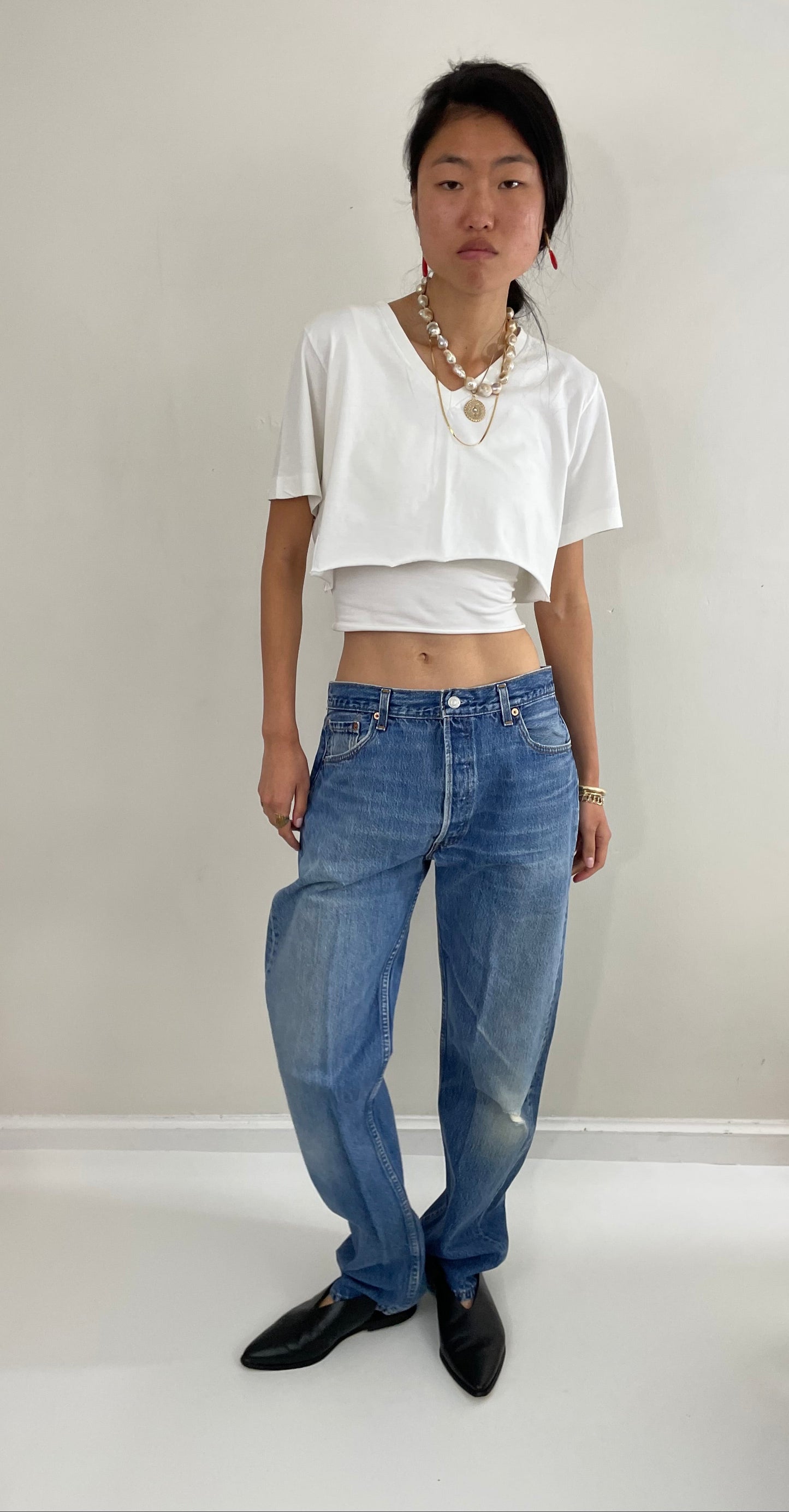 Vintage 80s Levis 501 button fly soft faded tall boyfriend baggy medium wash Levis jeans made in USA size 33 x 34