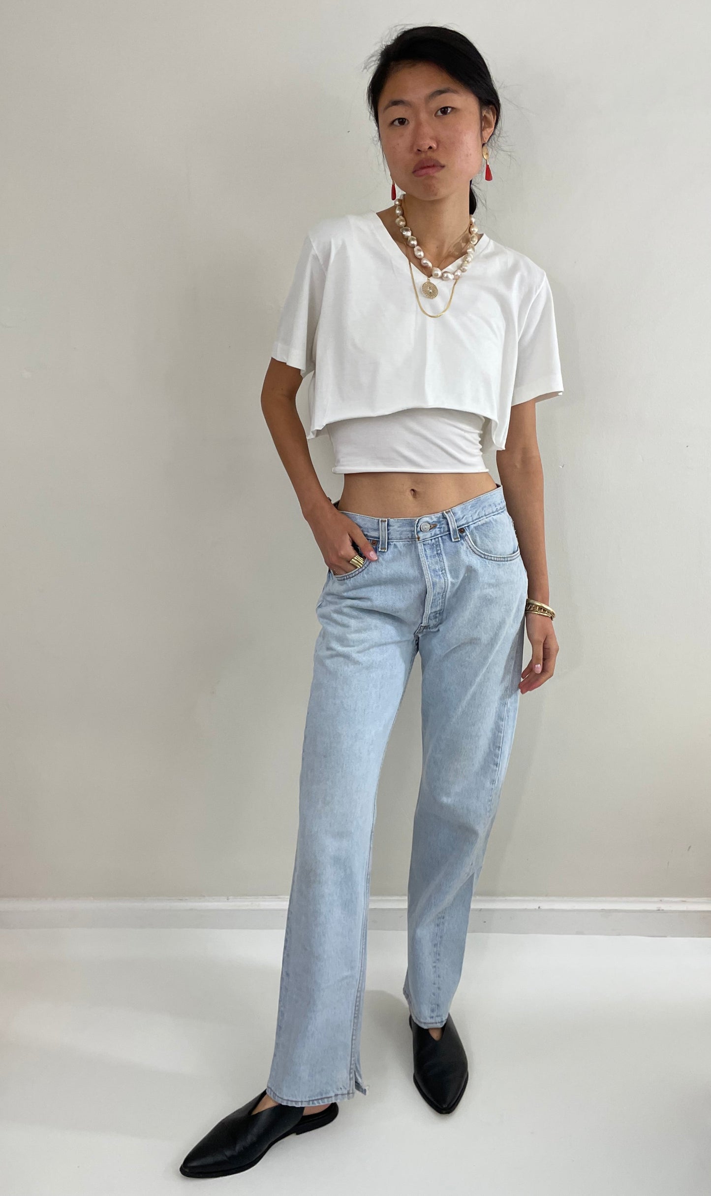 Vintage 80s Levi's 501 faded light wash button fly boyfriend Levis red tab jeans made in USA size 29 x 31