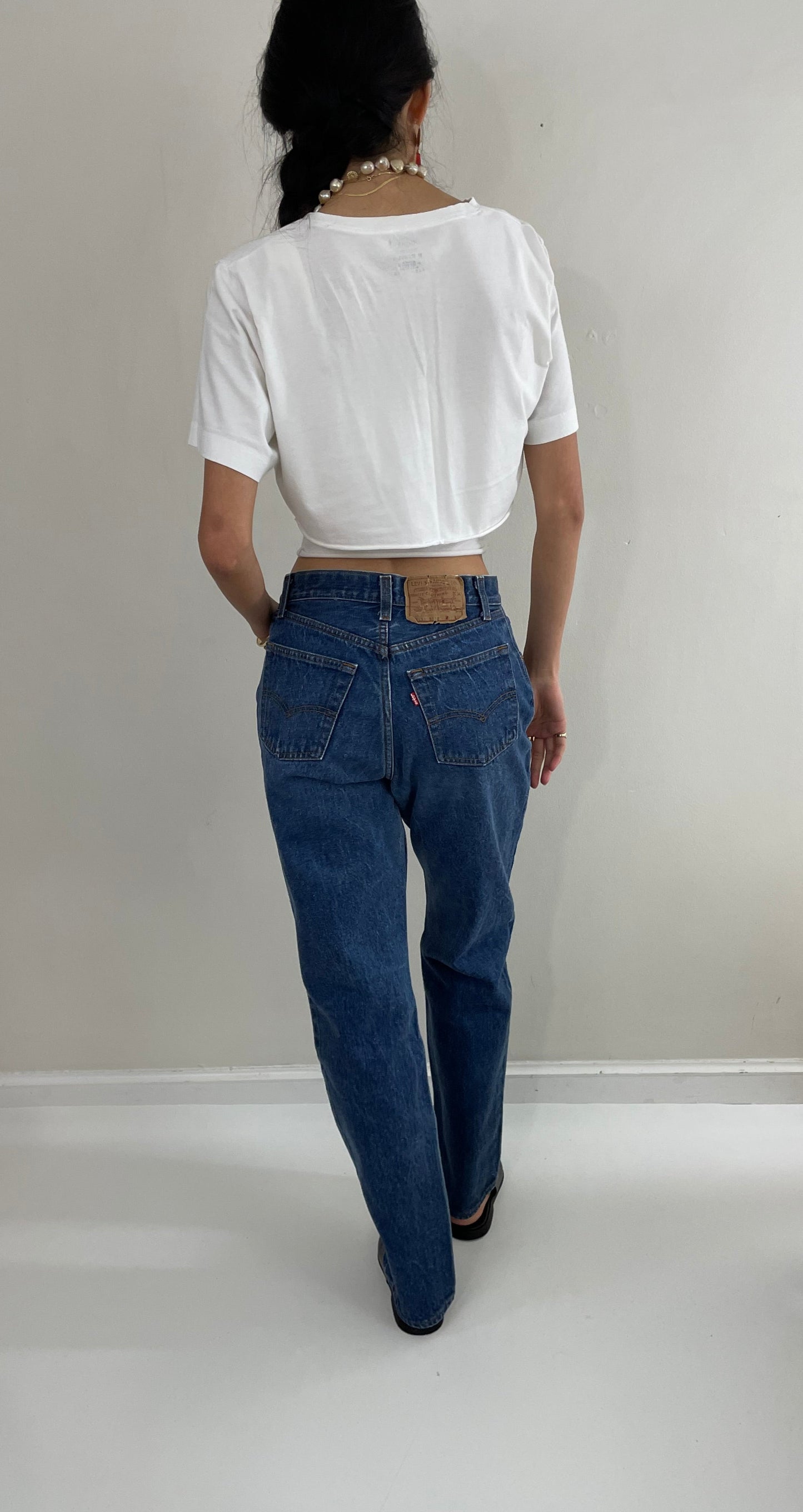 Vintage 80s Levi's 501 dark wash shrink to fit high waisted made for Women button fly tall Levis jeans size 27 x 32