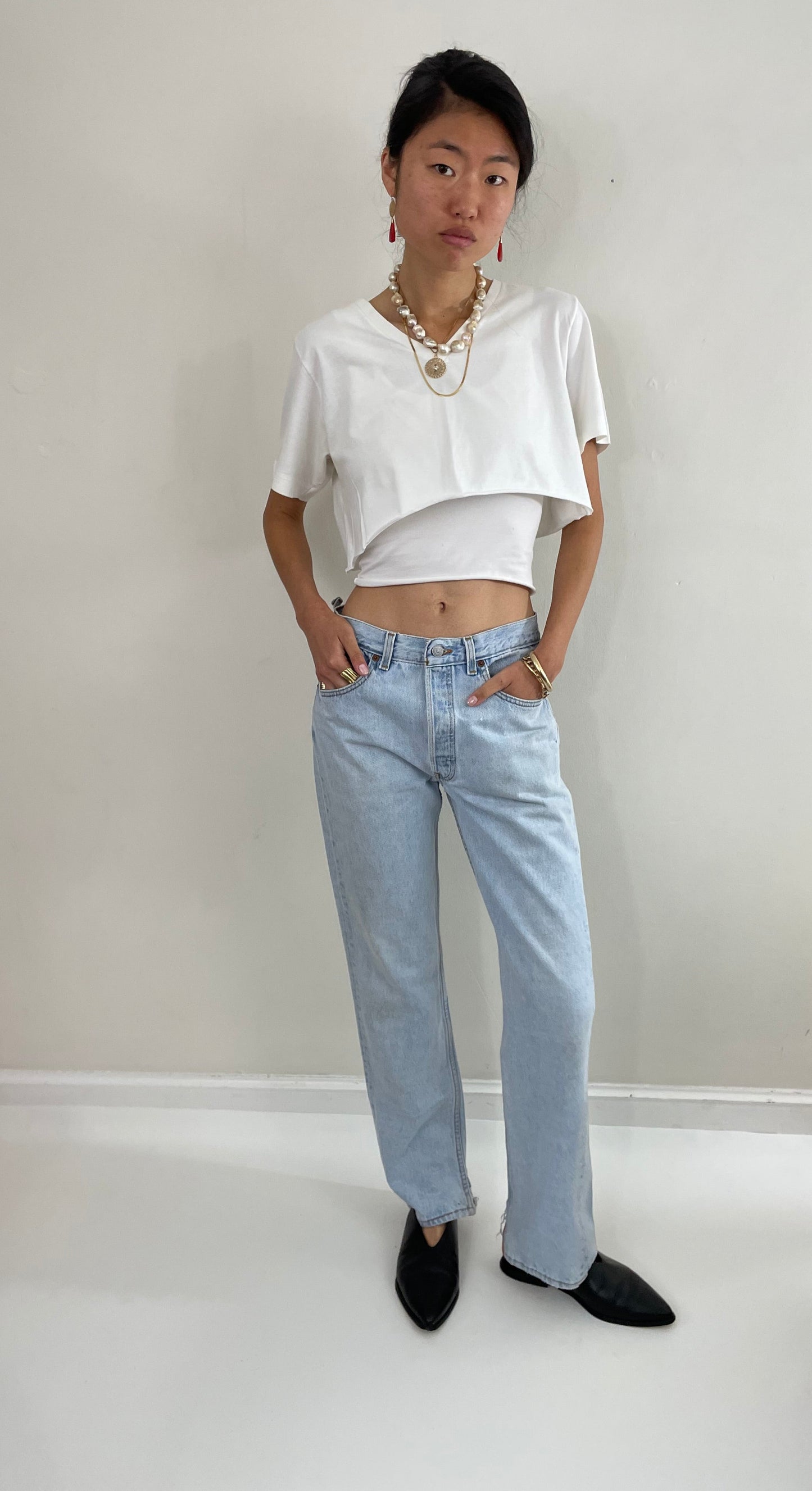 Vintage 80s Levi's 501 faded light wash button fly boyfriend Levis red tab jeans made in USA size 29 x 31