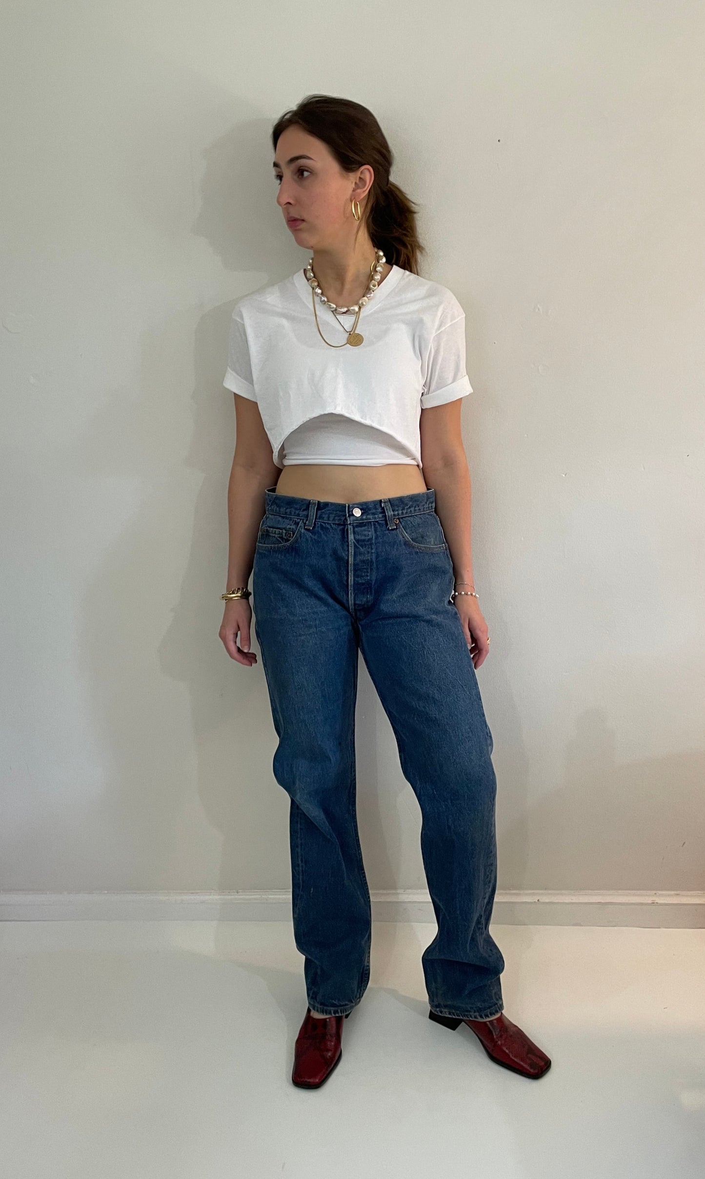 vintage Levi's 501 medium dark wash button fly tall boyfriend jeans made in USA size 33
