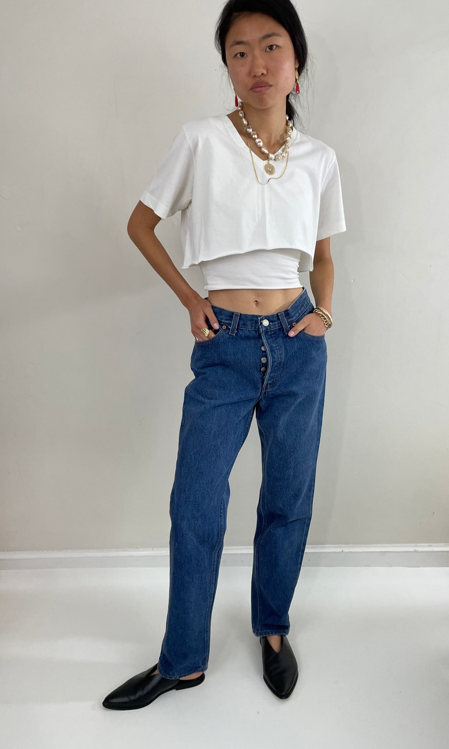 Vintage 80s Levi's 501 dark wash shrink to fit high waisted made for Women button fly tall Levis jeans size 27 x 32