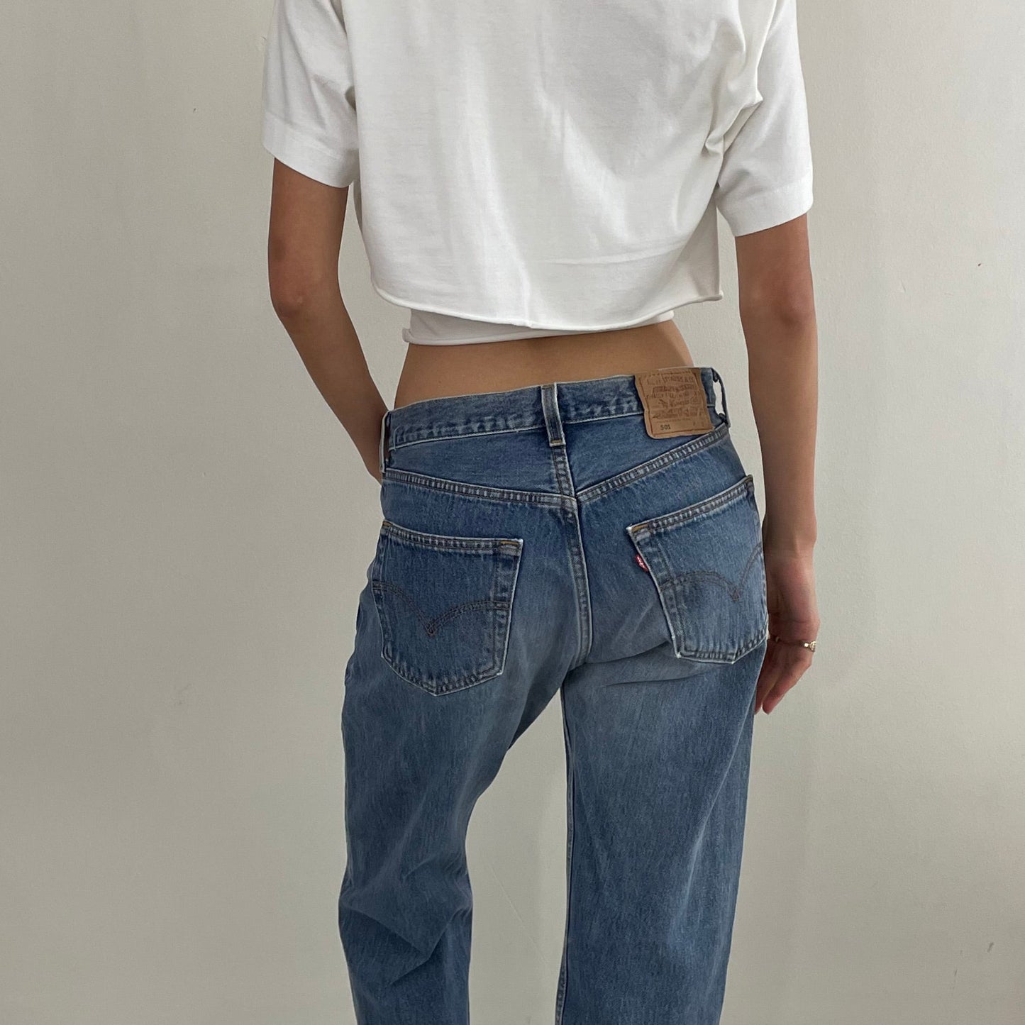 Vintage 80s Levi's 501 medium wash button fly iconic red tab Levis jeans made in USA size 30 x 30