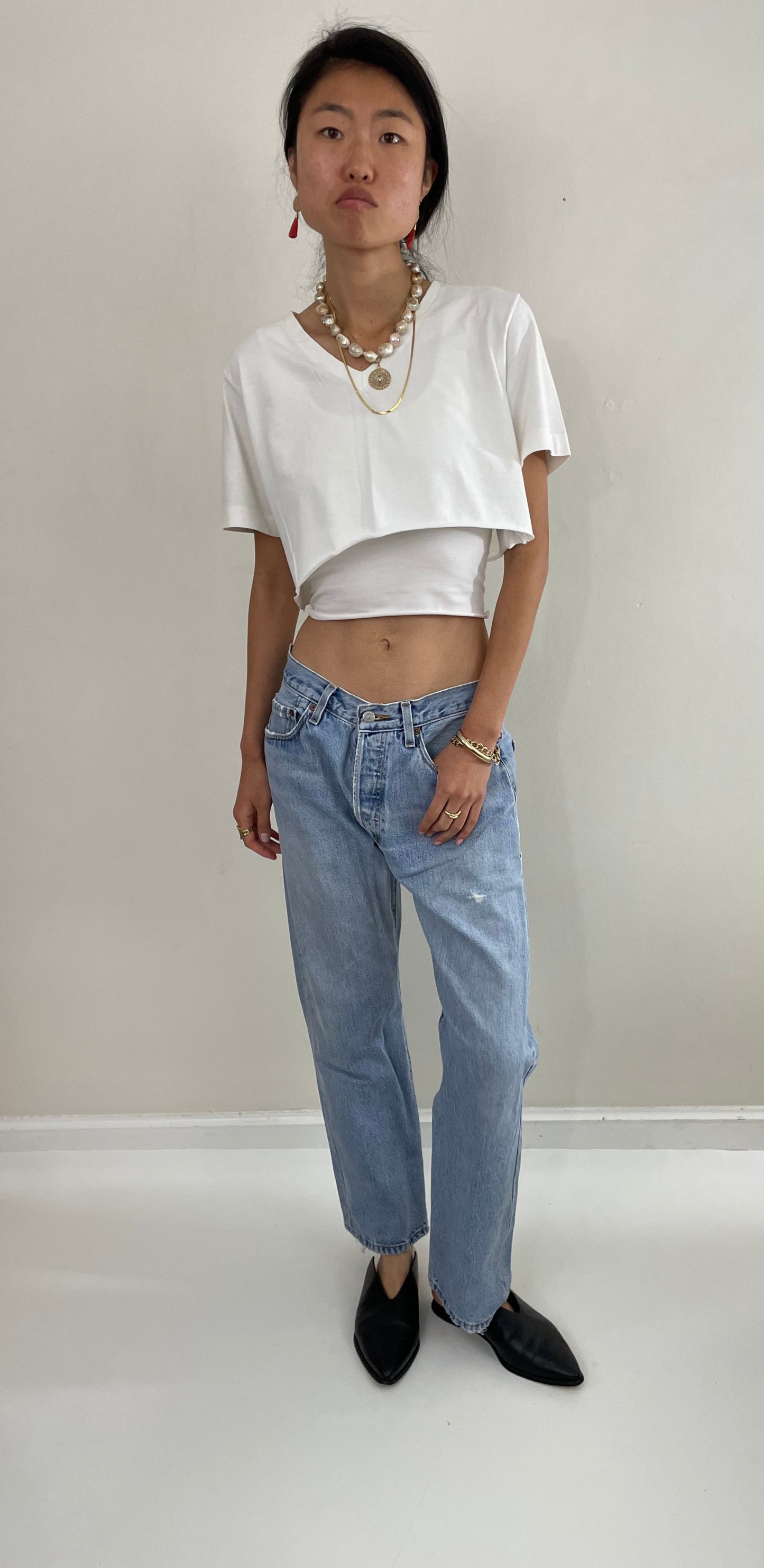 Vintage 80s Levi's 501 faded button fly medium light wash red tab Levis iconic jeans size 31 x 29
