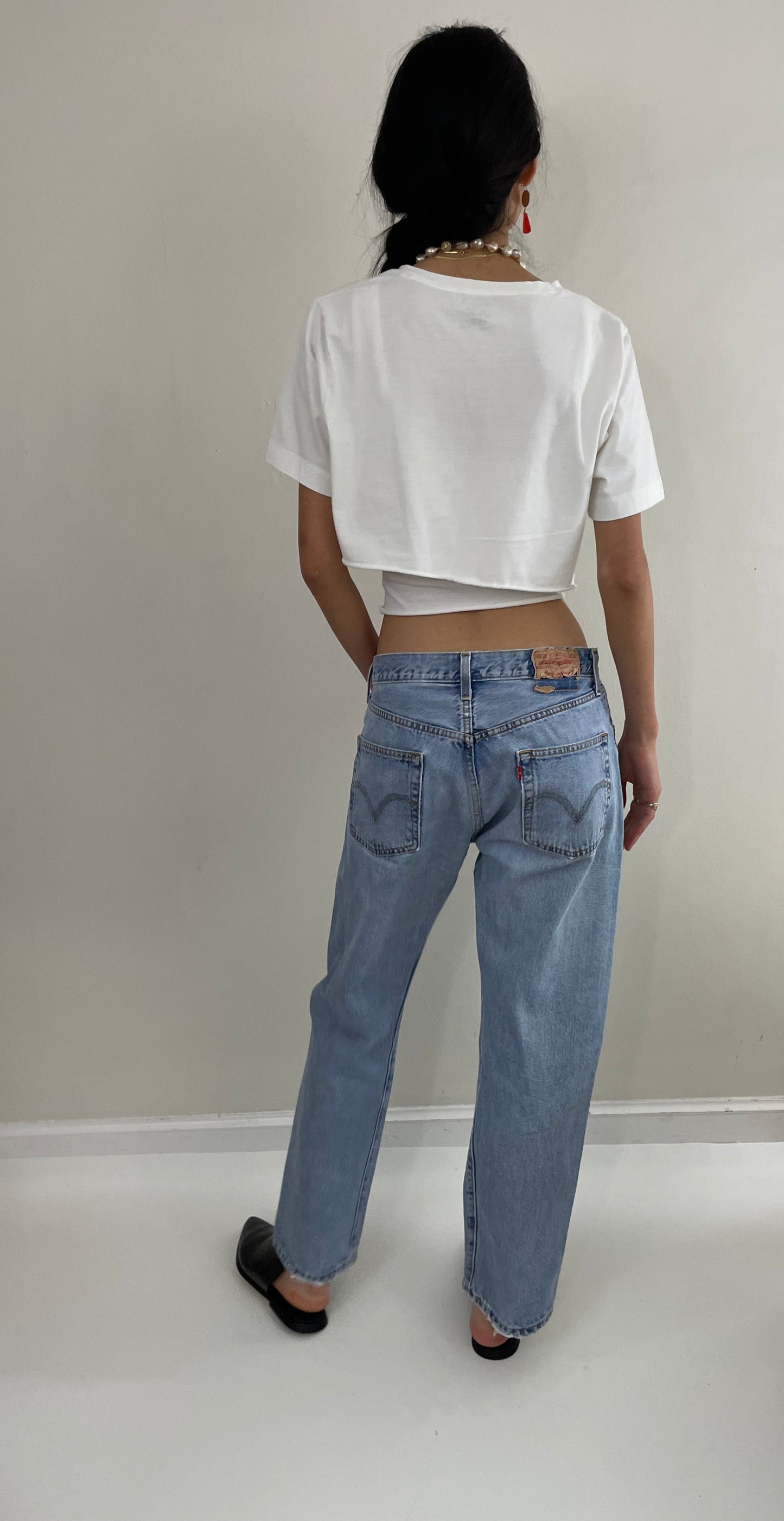 Vintage 80s Levi's 501 faded button fly medium light wash red tab Levis iconic jeans size 31 x 29