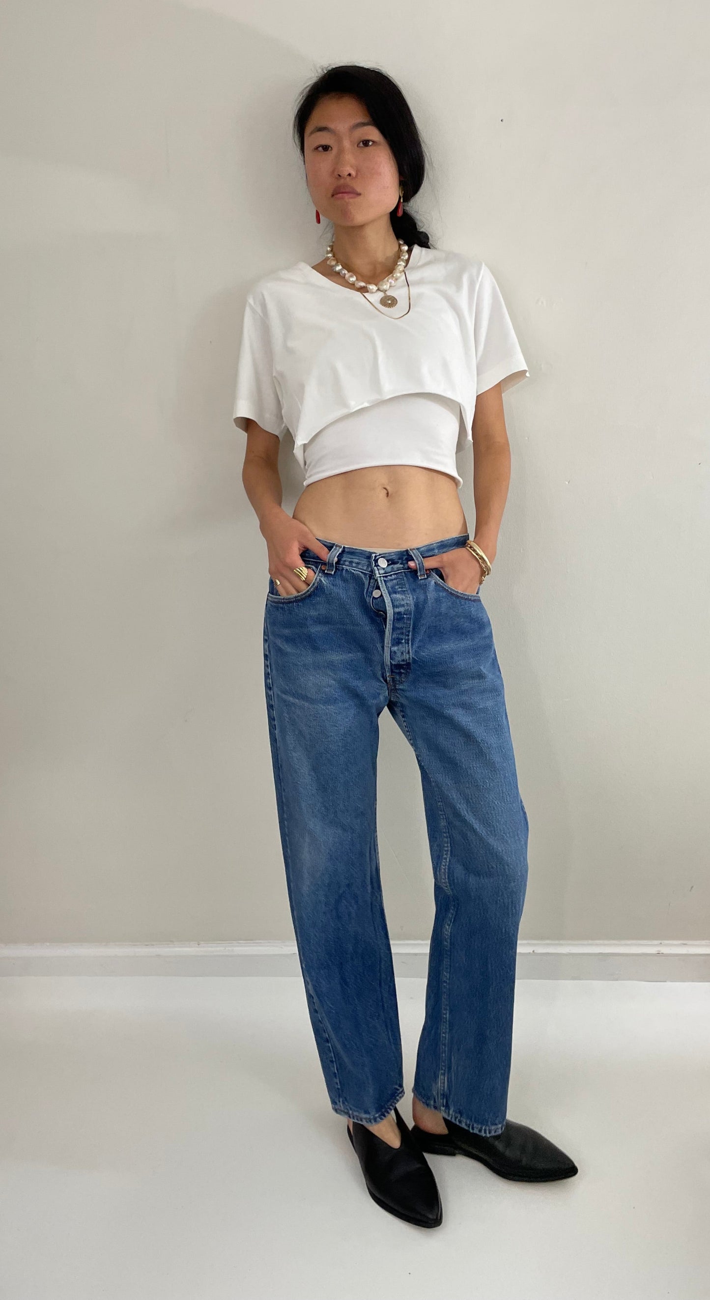 31 Vintage 80s Levi's 501 faded medium wash iconic red tab button fly LEVIS jeans made in USA size 31 x 29