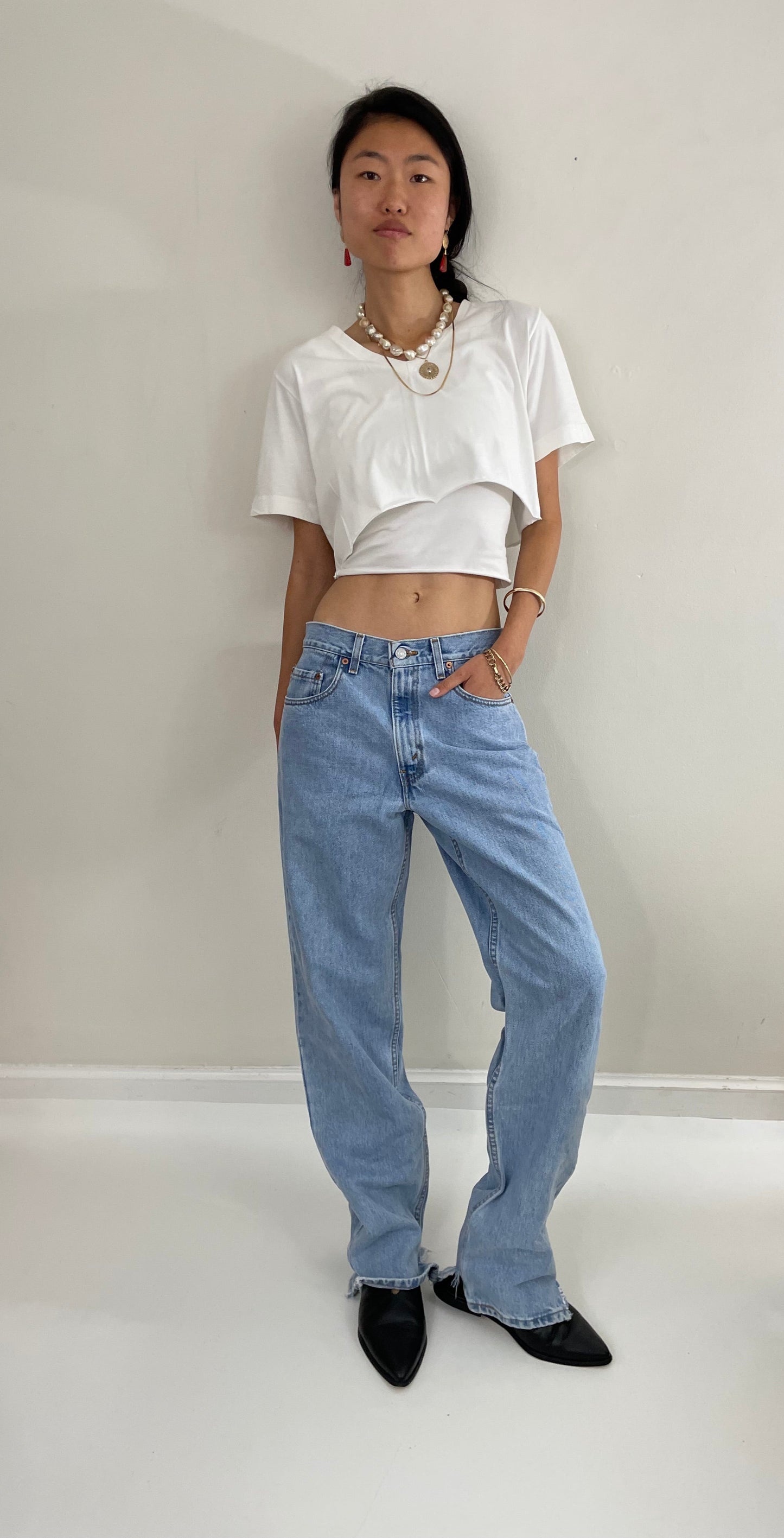 Vintage Levi's faded soft tall boyfriend relaxed fit zipper fly red tab light wash Levis 550 jeans size 31 x 34