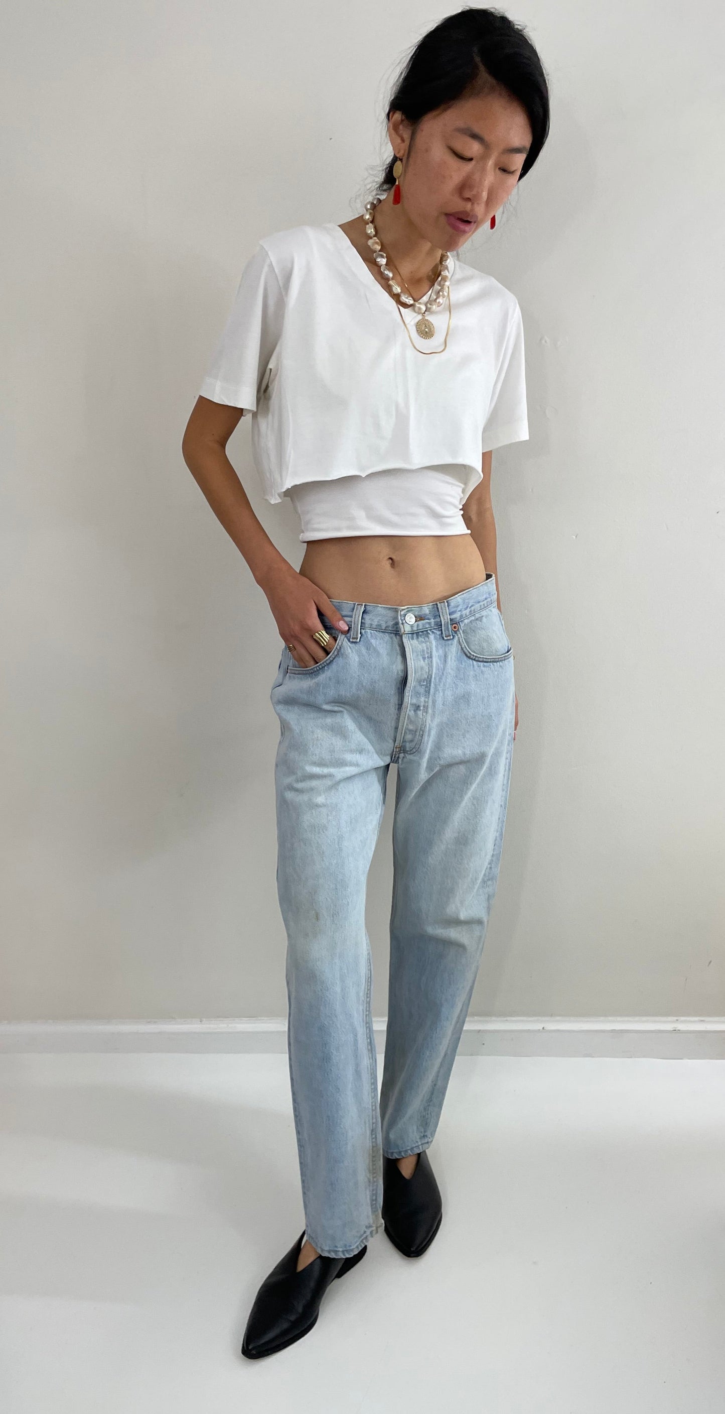 Vintage 80s Levi's 501 faded button fly light stone wash red tab Levis iconic jeans USA size 32 x 29