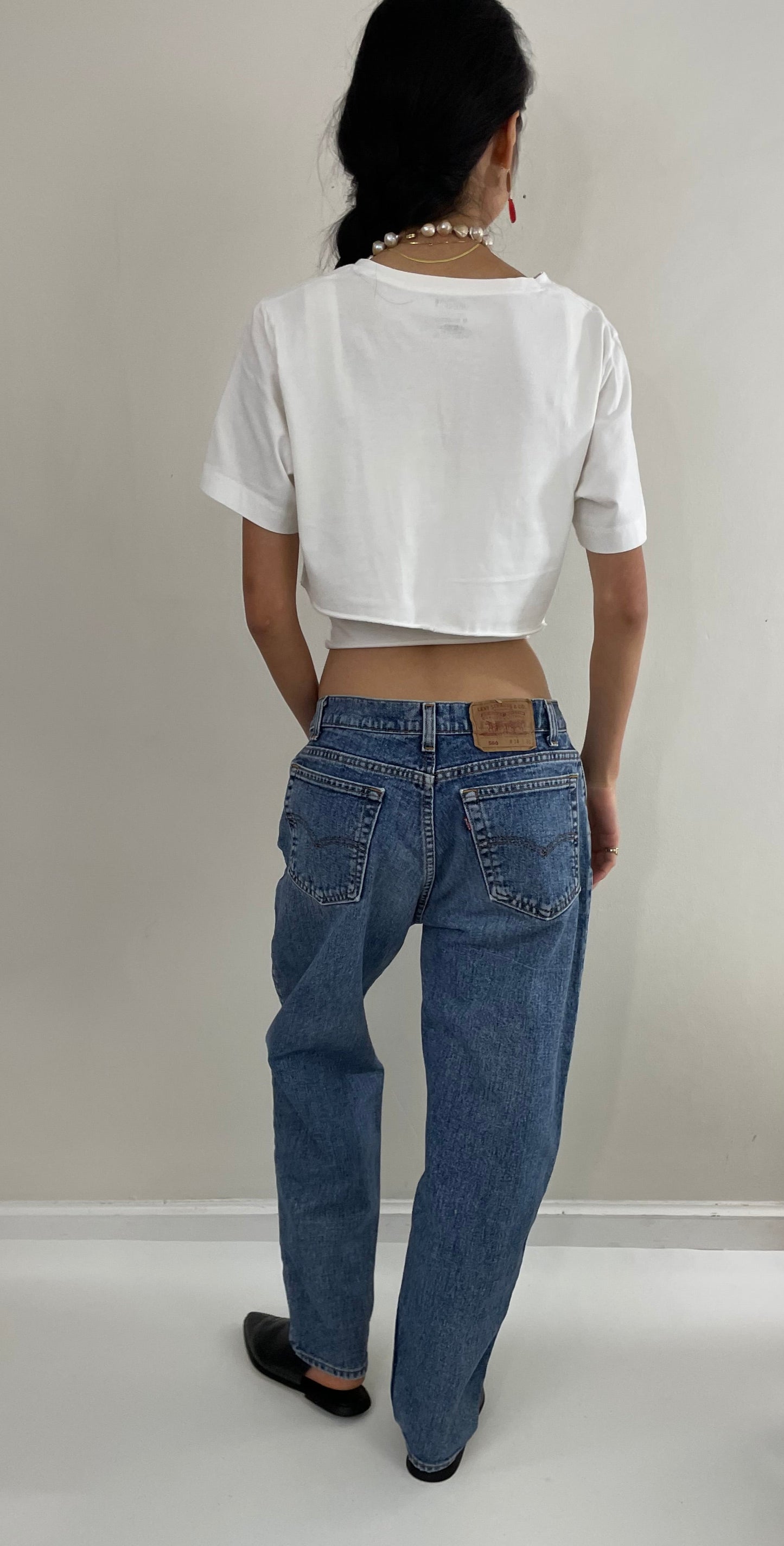 Vintage 80s Levi's 560 medium wash high waisted zipper relaxed faded red tab Levis jeans USA size 31 x 30