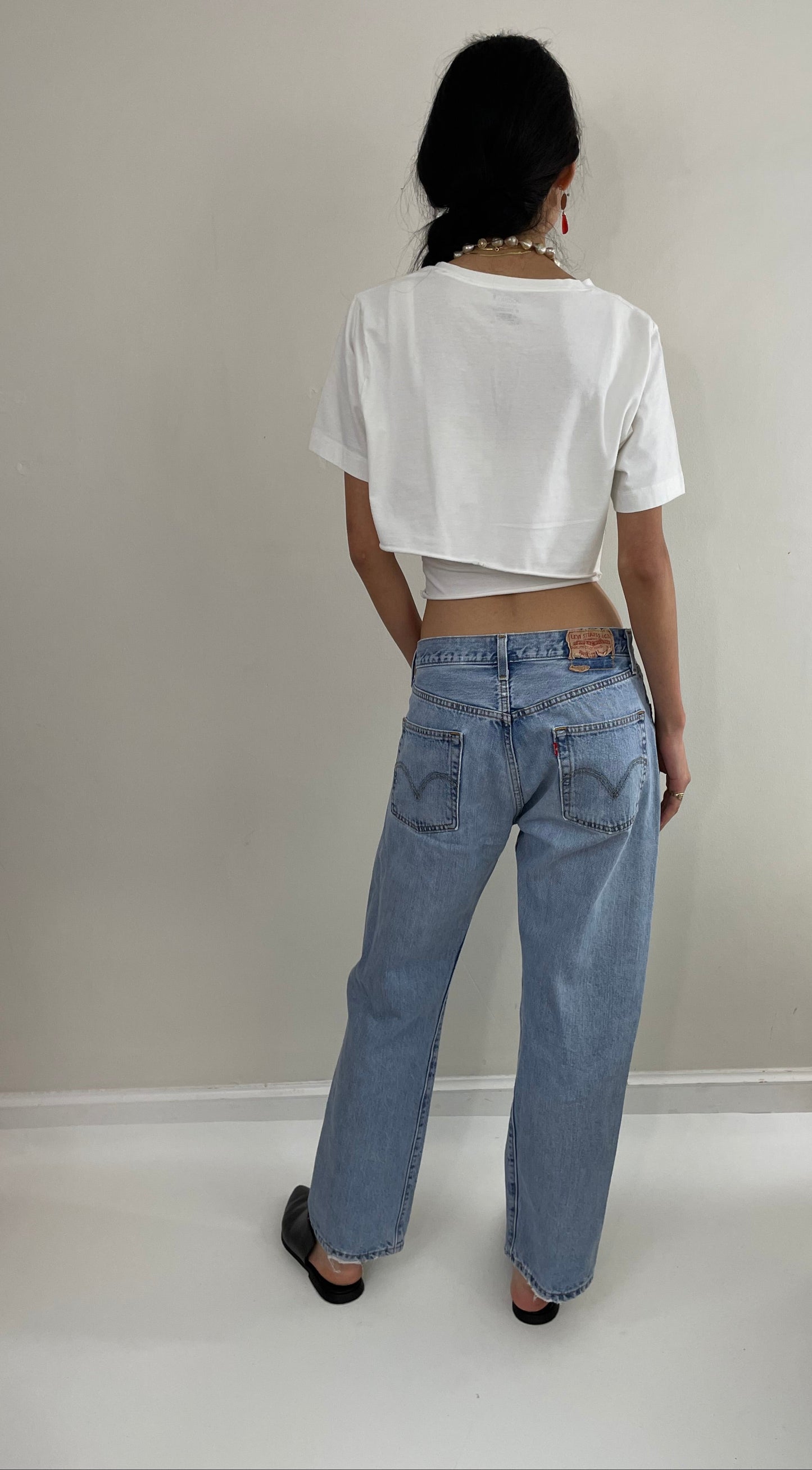 Vintage 80s Levi's 501 faded button fly medium light wash red tab Levis iconic jeans size 31 x 29