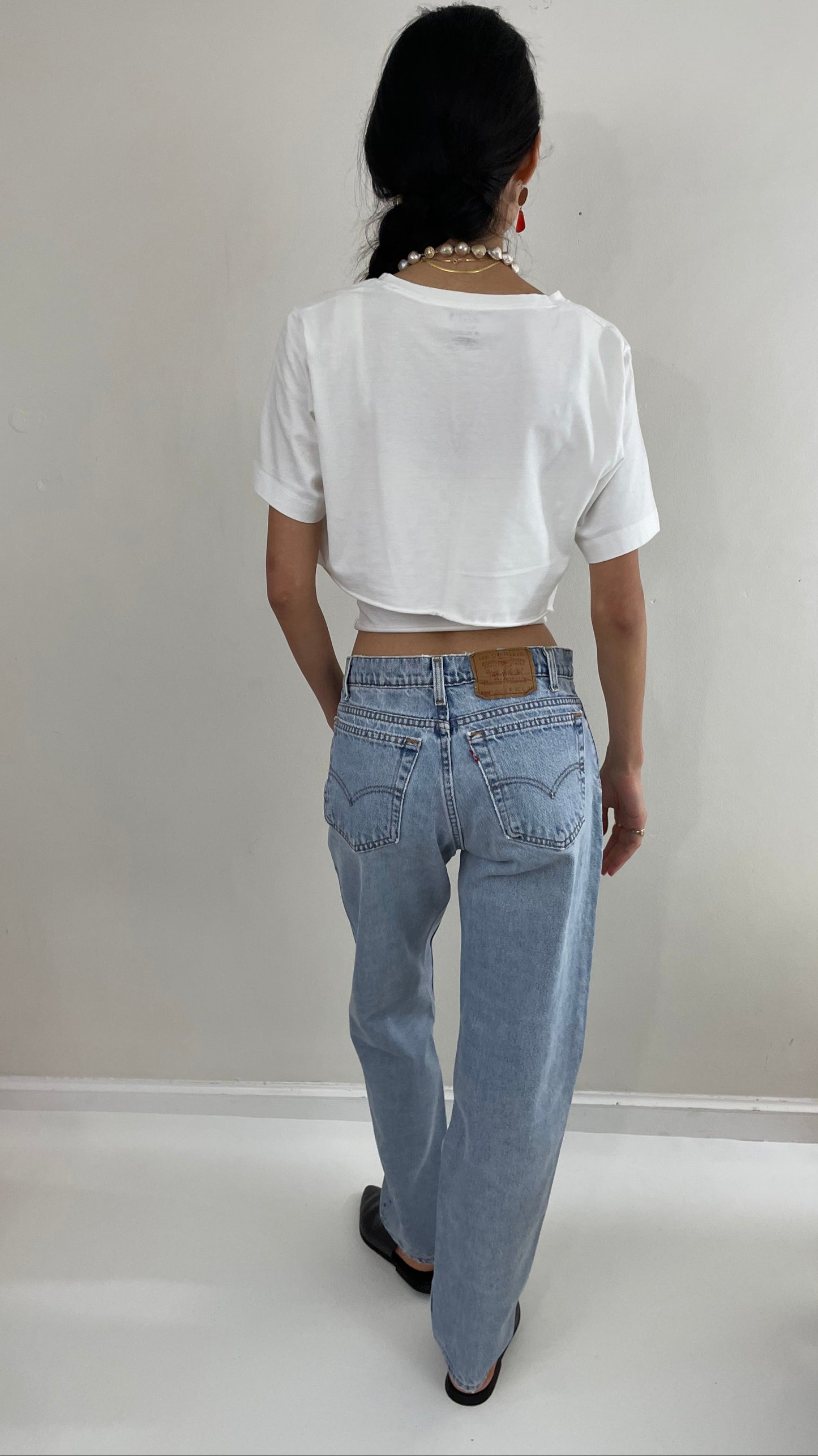 Vintage Levi's faded soft boyfriend relaxed fit high waisted zipper fly red tab light wash Levis 550 Dad jeans made in USA size Waist 31 x 33
