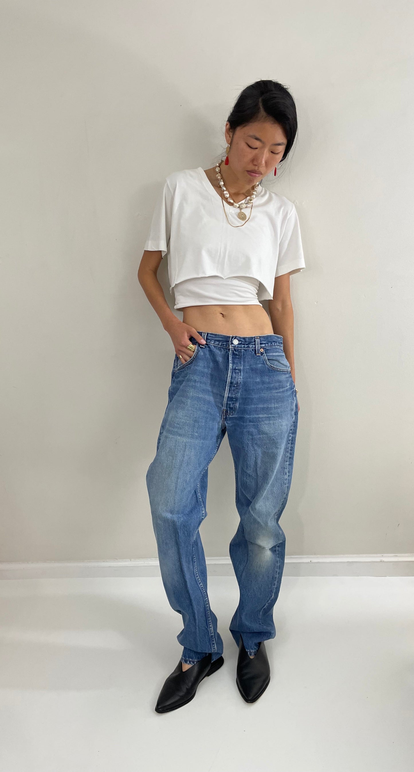 Vintage 80s Levis 501 button fly soft faded tall boyfriend baggy medium wash Levis jeans made in USA size 33 x 34
