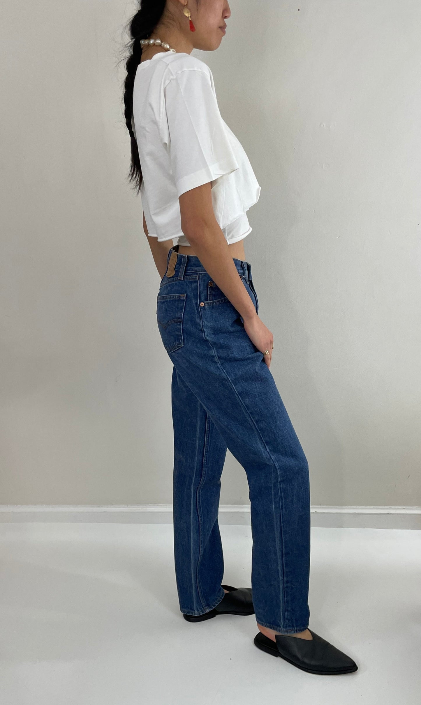 Vintage 80s Levi's 501 dark wash shrink to fit high waisted made for Women button fly tall Levis jeans size 27 x 32