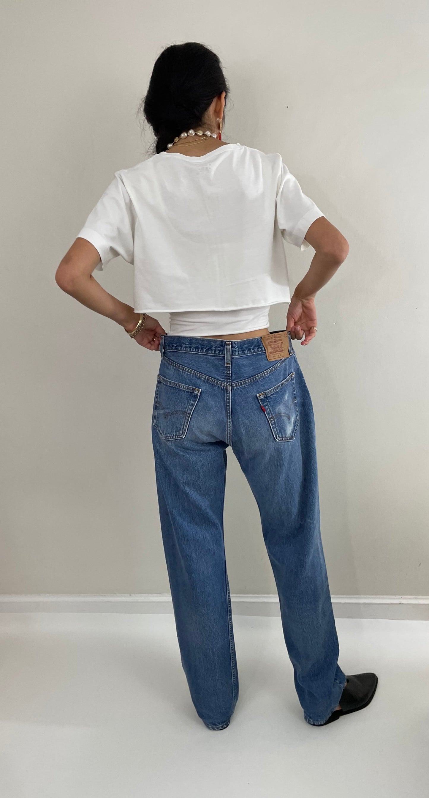Vintage 80s Levis 501 button fly soft faded tall boyfriend baggy medium wash Levis jeans made in USA size 33 x 34