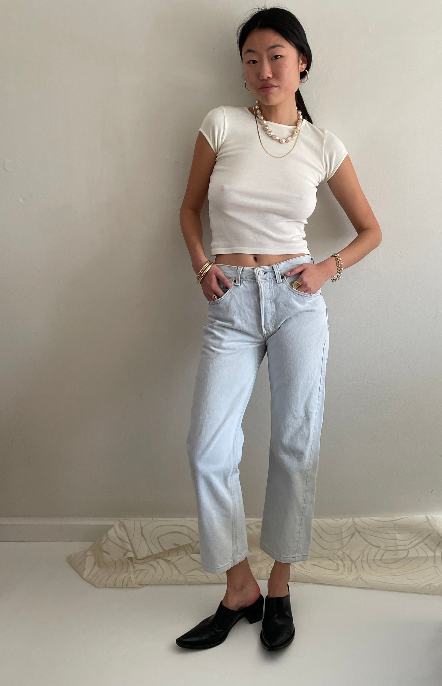 Vintage Levis 501 button fly faded boyfriend light stonewash jeans made in USA size 28
