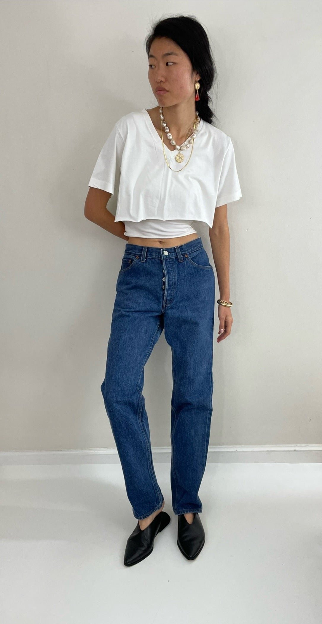 Vintage 80s Levi's 501 dark wash shrink to fit high waisted made for Women button fly tall Levis jeans size 27 x 32