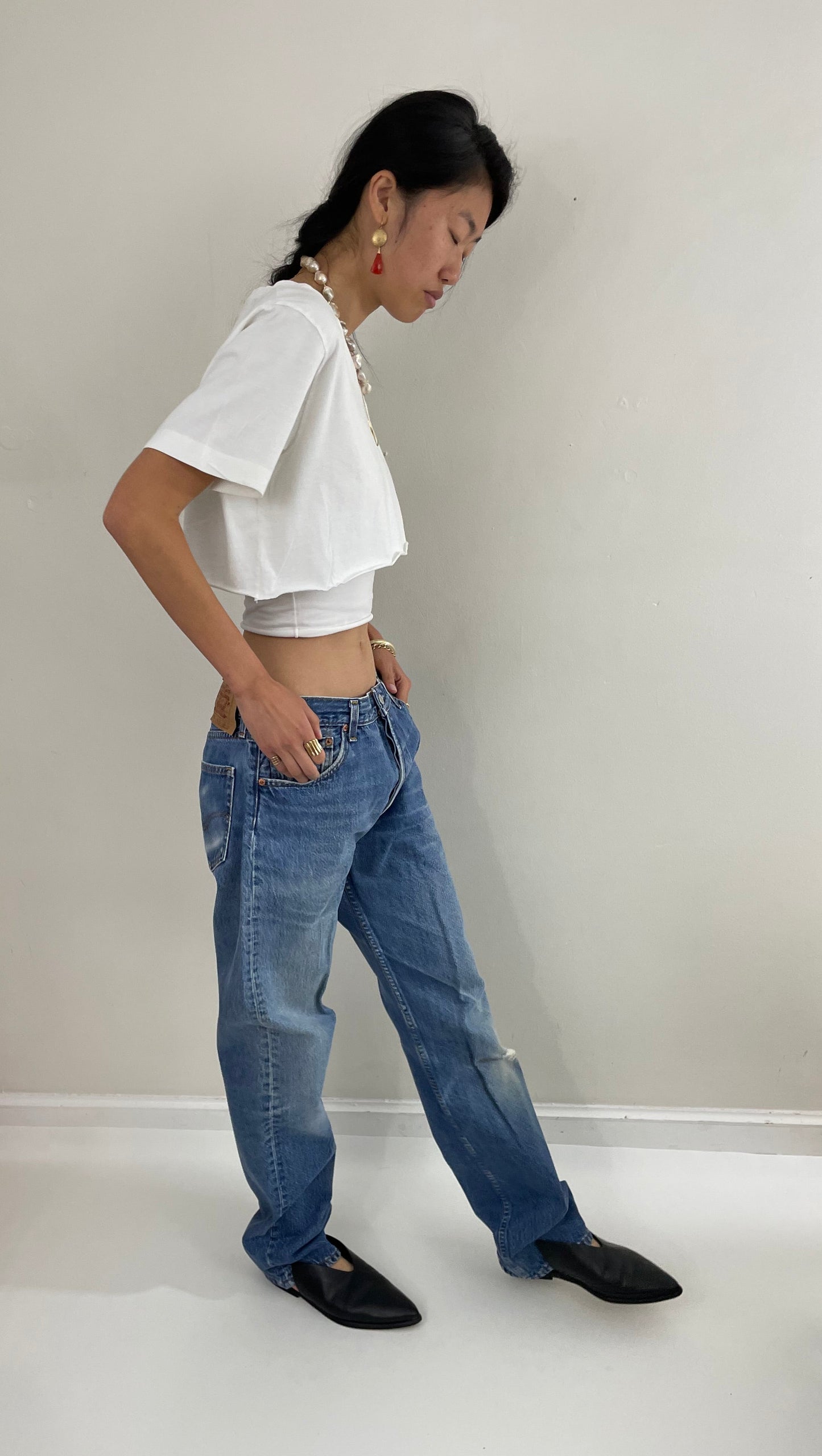 Vintage 80s Levis 501 button fly soft faded tall boyfriend baggy medium wash Levis jeans made in USA size 33 x 34