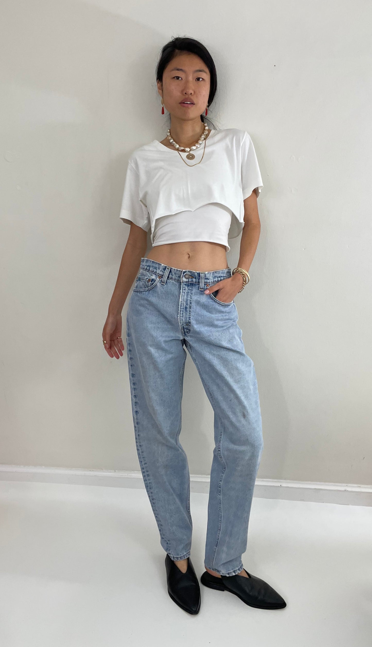 Vintage Levi's faded soft boyfriend relaxed fit high waisted zipper fly red tab light wash Levis 550 Dad jeans made in USA size Waist 31 x 33