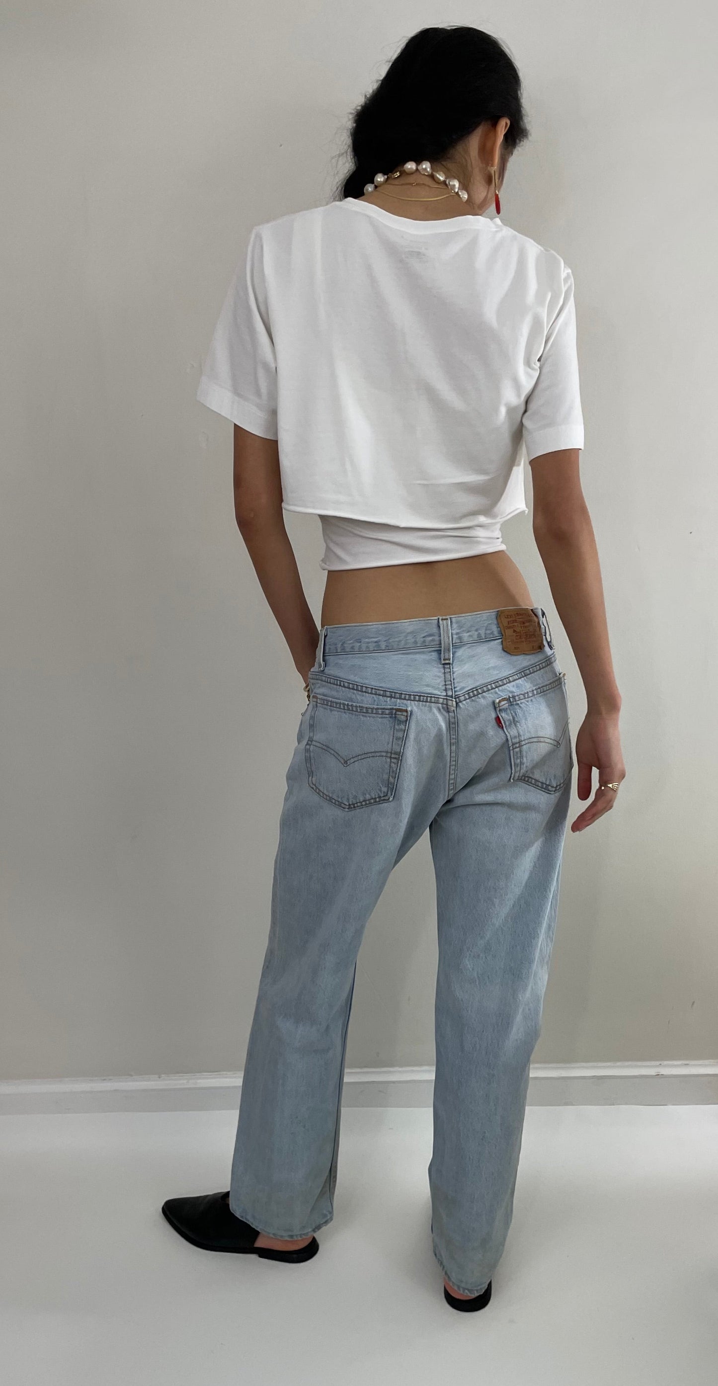 Vintage 80s Levi's 501 faded button fly light stone wash red tab Levis iconic jeans USA size 32 x 29