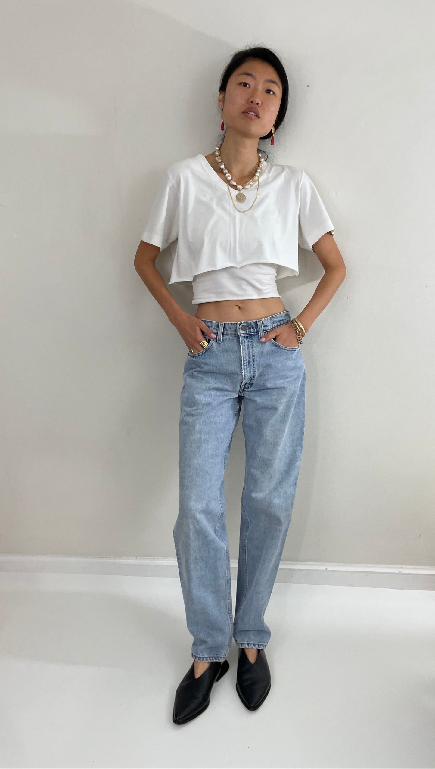 Vintage Levi's faded soft boyfriend relaxed fit high waisted zipper fly red tab light wash Levis 550 Dad jeans made in USA size Waist 31 x 33