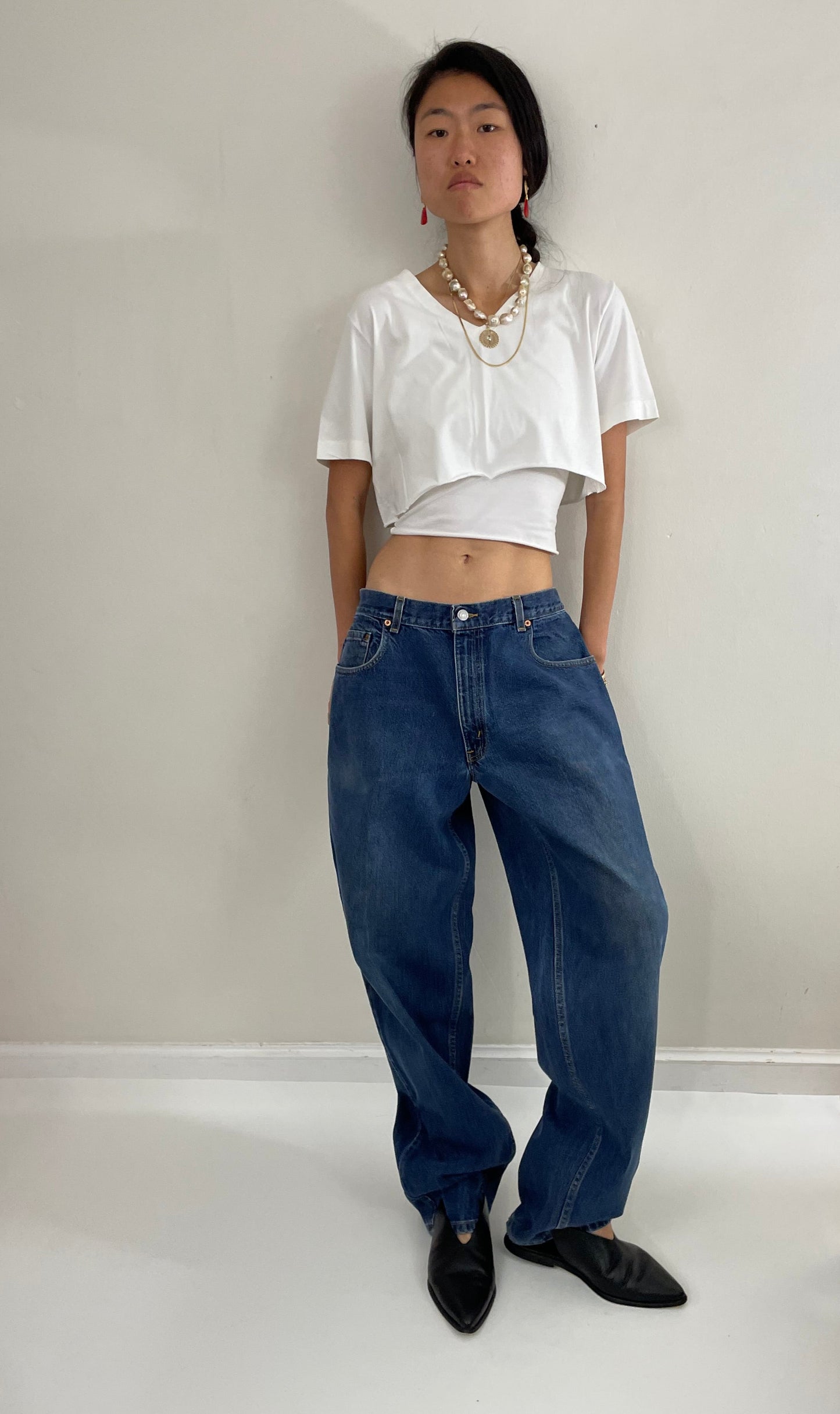 vintage Levi's 570 tall baggy fit zipper fly medium wash 90s barrel leg hip hop jeans size 32 x 35