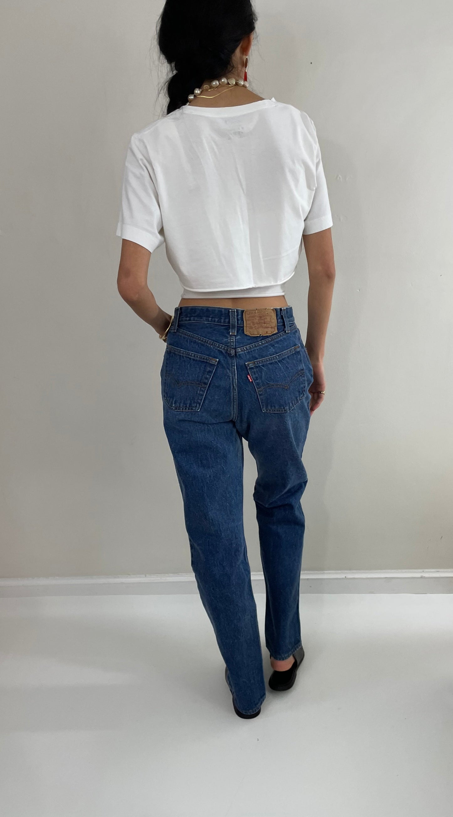 Vintage 80s Levi's 501 dark wash shrink to fit high waisted made for Women button fly tall Levis jeans size 27 x 32