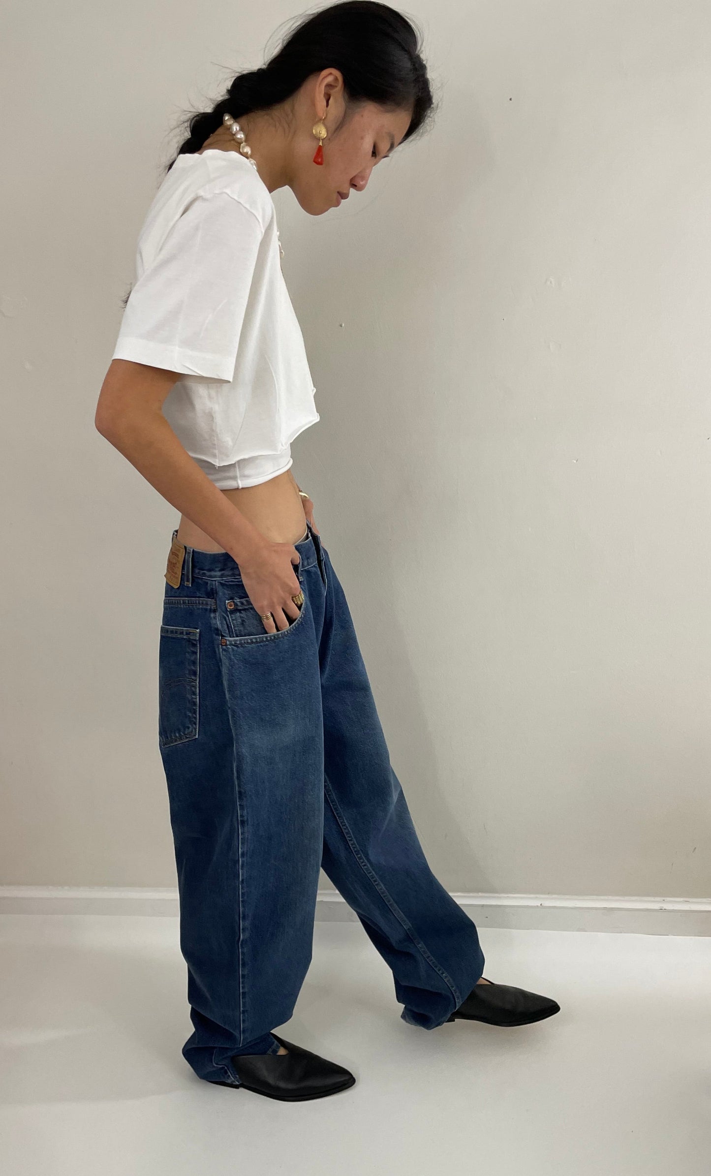 vintage Levi's 570 tall baggy fit zipper fly medium wash 90s barrel leg hip hop jeans size 32 x 35