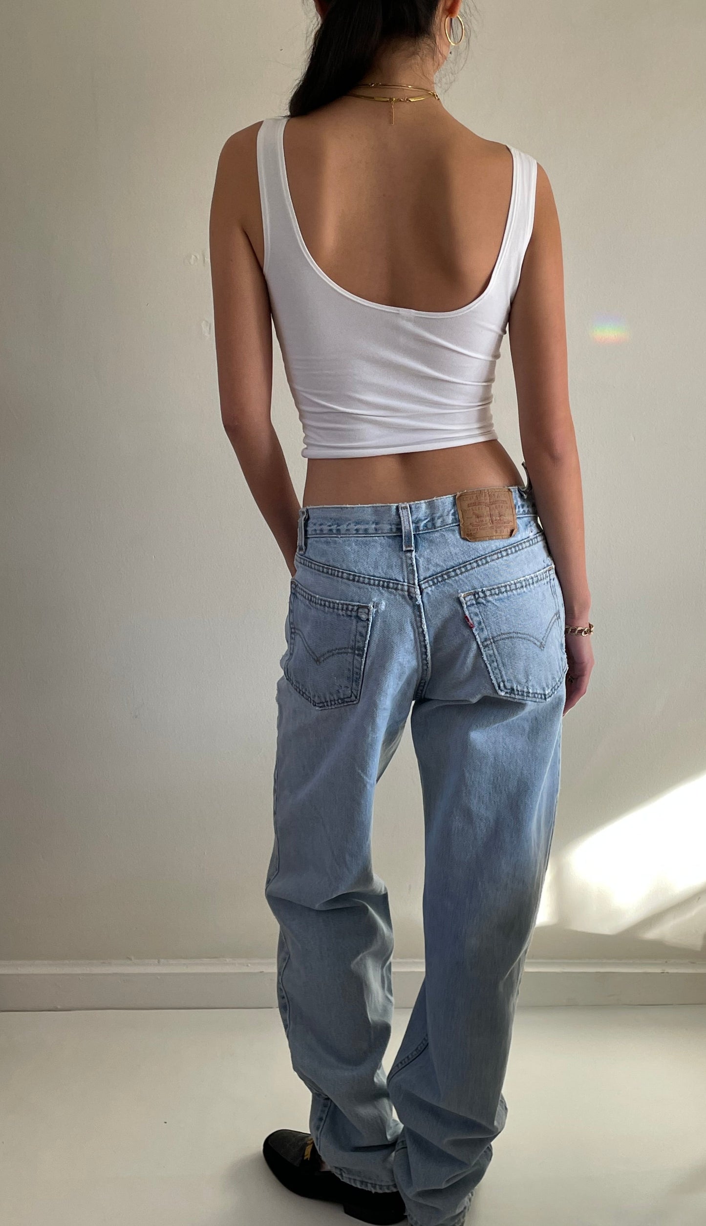 vintage Levi's 550 light wash high waisted zipper fly faded slouchy baggy Levis boyfriend jeans size 31