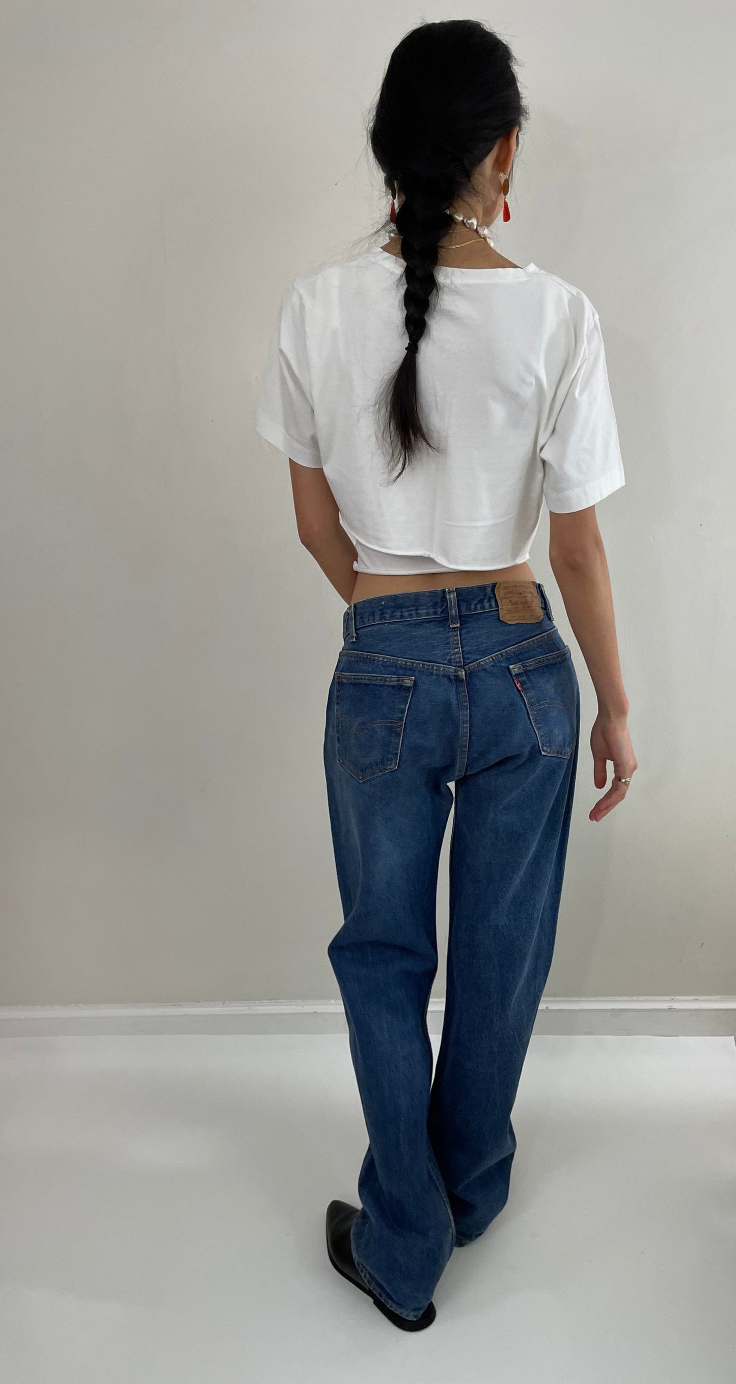 vintage Levi's 501 0115 medium wash button fly tall boyfriend jeans made in USA size 33 x 34