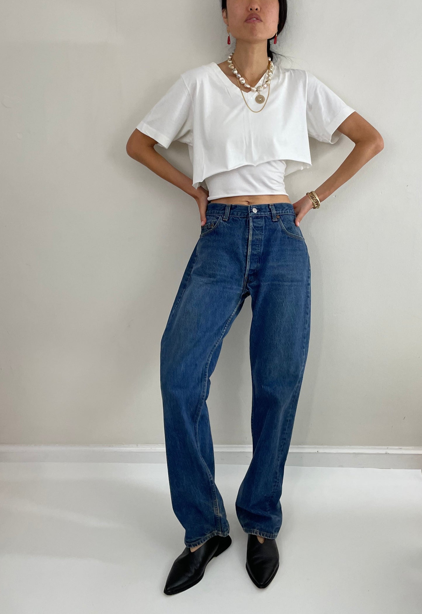 vintage Levi's 501 0115 medium wash button fly tall boyfriend jeans made in USA size 33 x 34