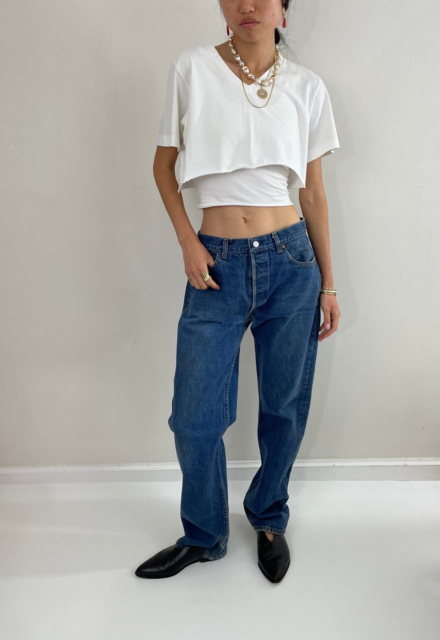 vintage Levi's 501 0115 medium wash button fly tall boyfriend jeans made in USA size 33 x 34