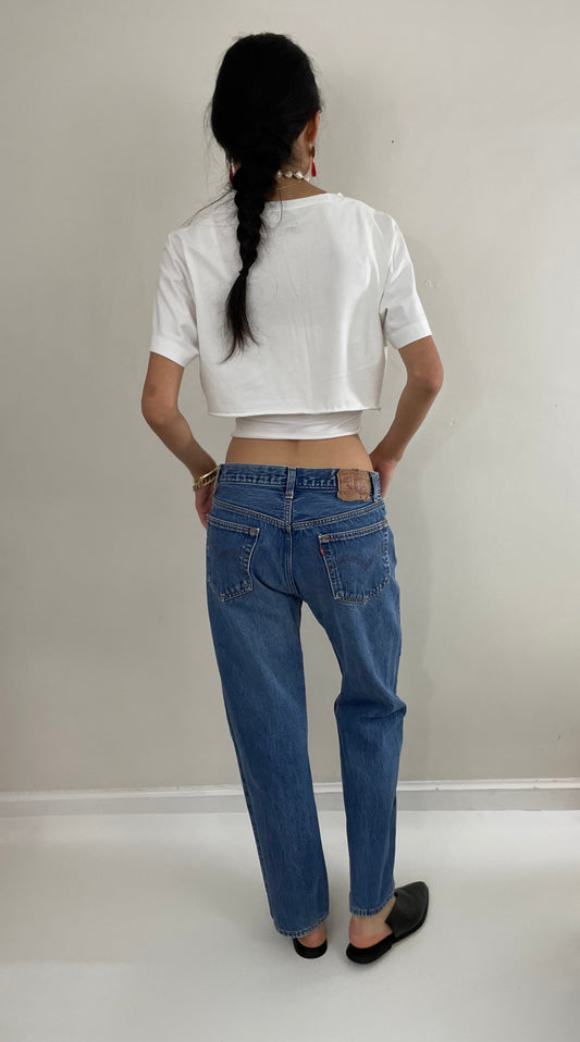 31 Vintage 80s Levi's 501 faded medium wash iconic red tab button fly LEVIS jeans made in USA size 31 x 29