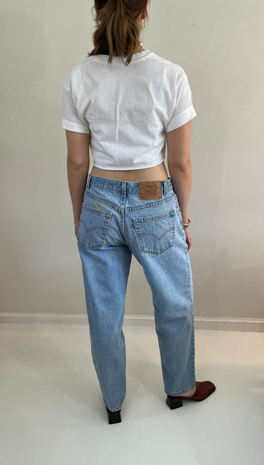 vintage 80s Levi's 560 faded light wash high waisted zipper loose baggy red tab Levis jeans size 32 x 30