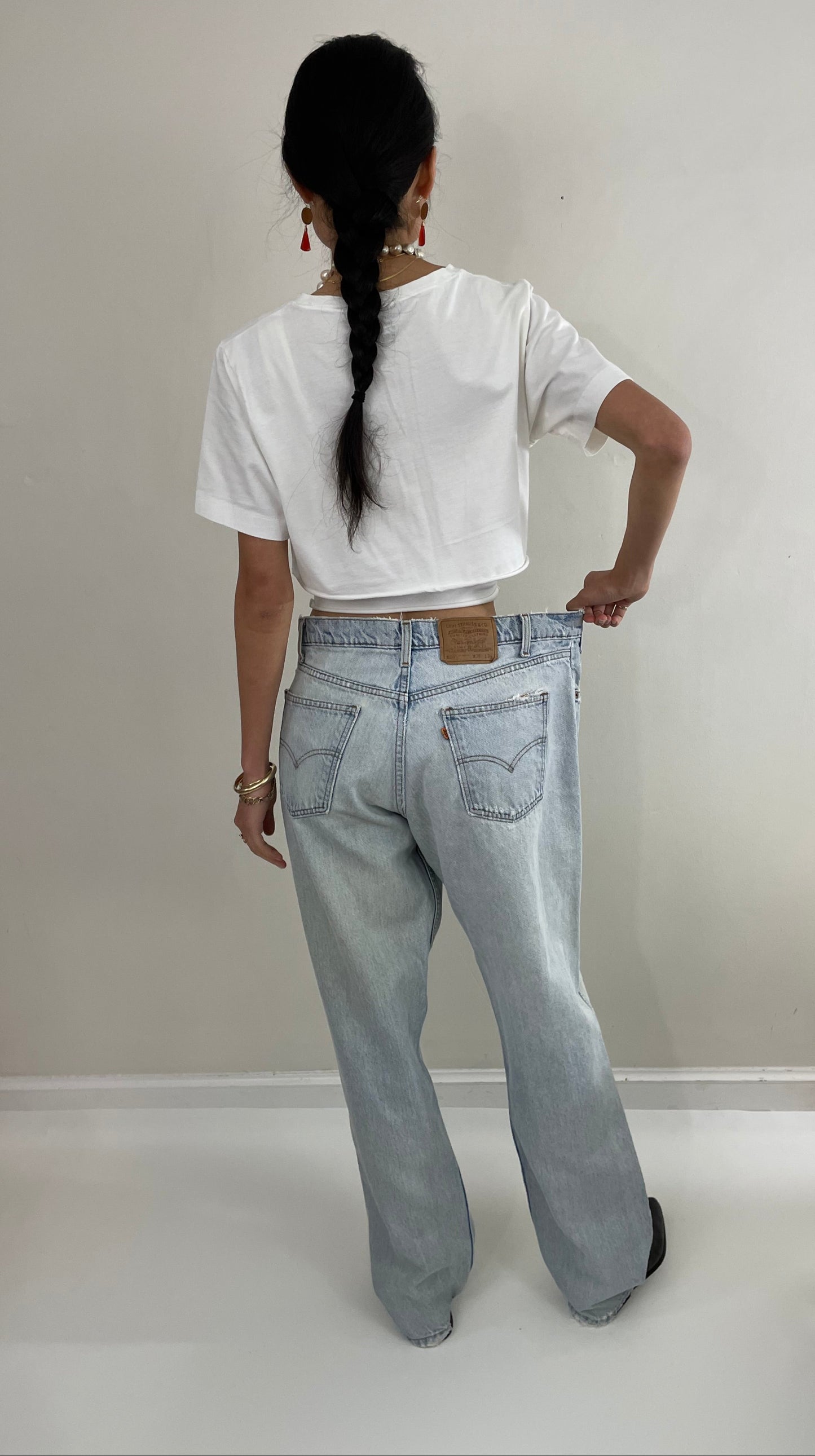 vintage Levi's  550 baggy faded light wash zipper relaxed fit tall Levis dad orange tab jeans size 35 x 33