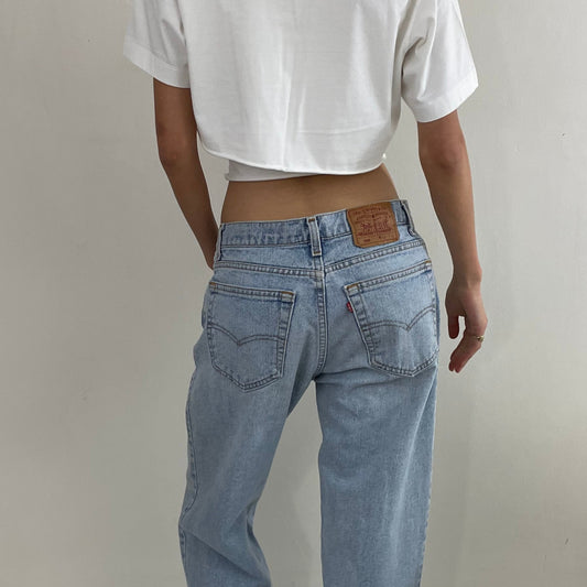 Vintage 80s Levi's faded boyfriend relaxed fit high waisted zipper fly red tab light wash Levis 550 Dad jeans made in USA size 32x32
