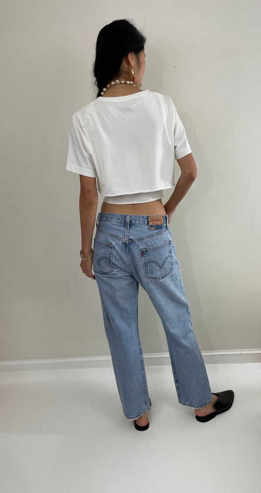 Vintage 80s Levi's 501 faded button fly medium light wash red tab Levis iconic jeans size 31 x 29