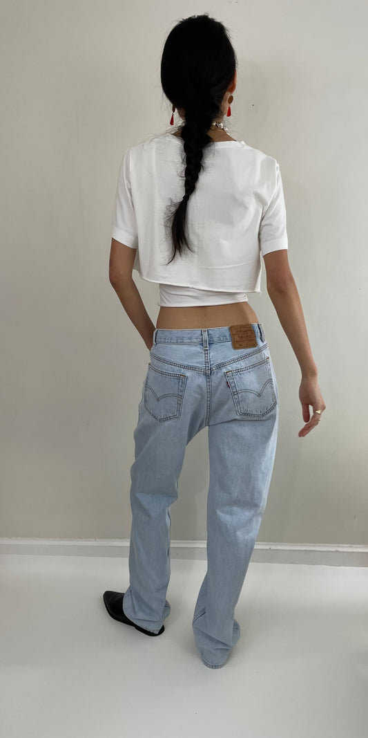 80s vintage faded Levi's 501 button fly light wash red tab tall Levis jeans made in USA size 32 x 33.5