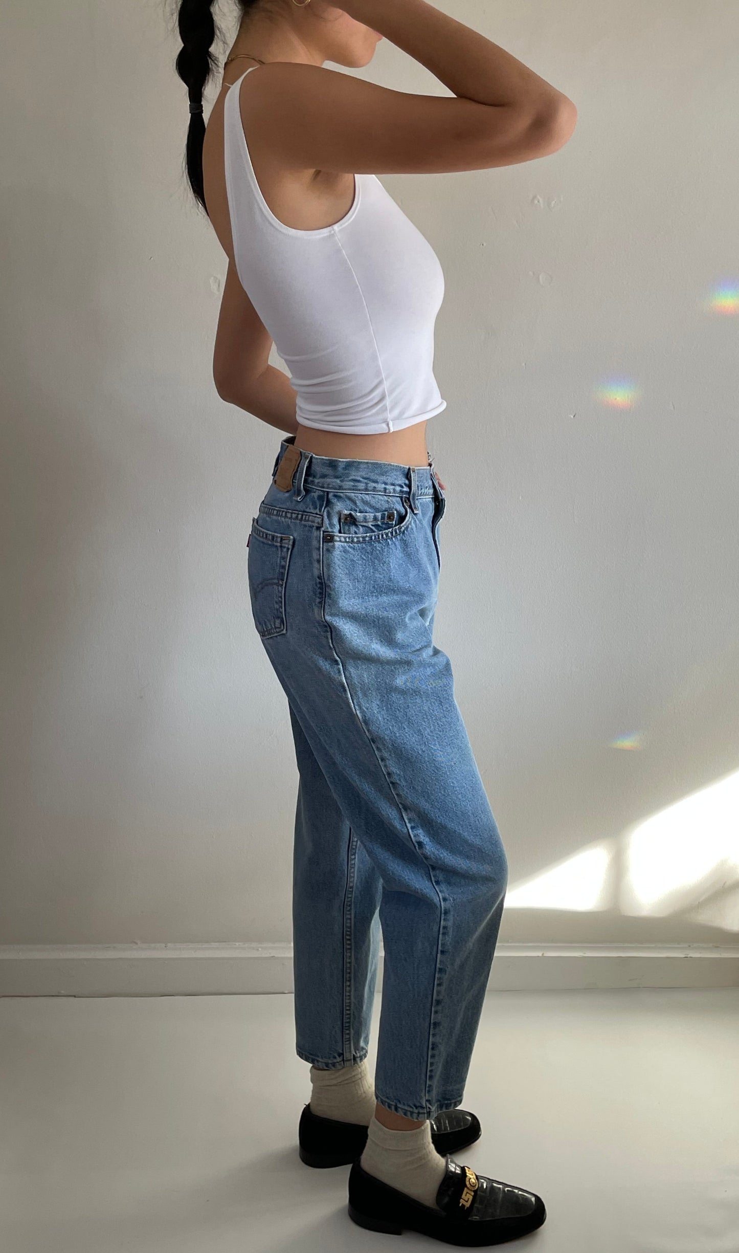 Vintage Levi's 550 high waisted faded light wash zipper Levis jeans made in USA size 29