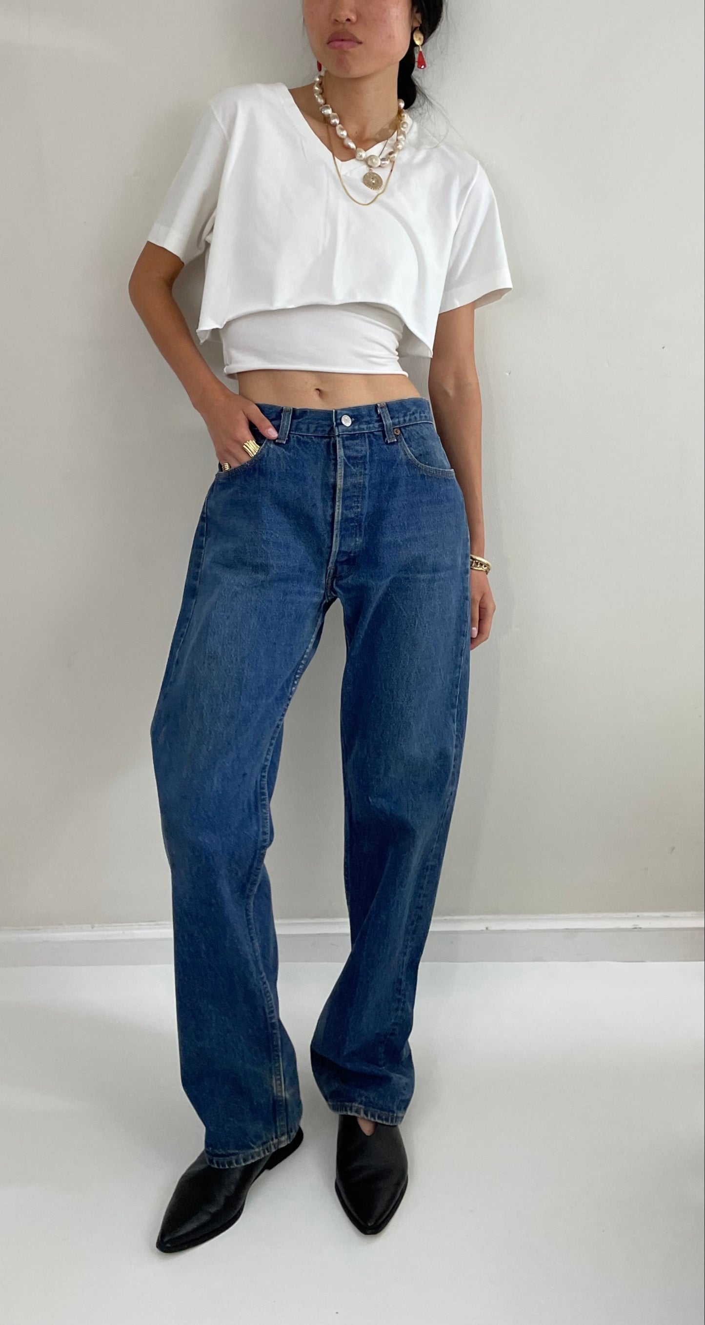 vintage Levi's 501 0115 medium wash button fly tall boyfriend jeans made in USA size 33 x 34