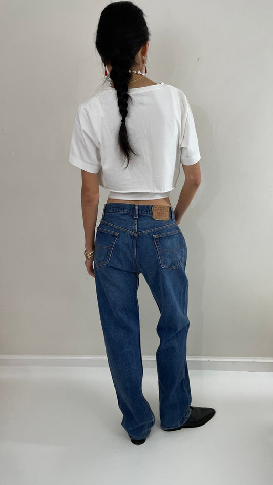 vintage Levi's 501 0115 medium wash button fly tall boyfriend jeans made in USA size 33 x 34