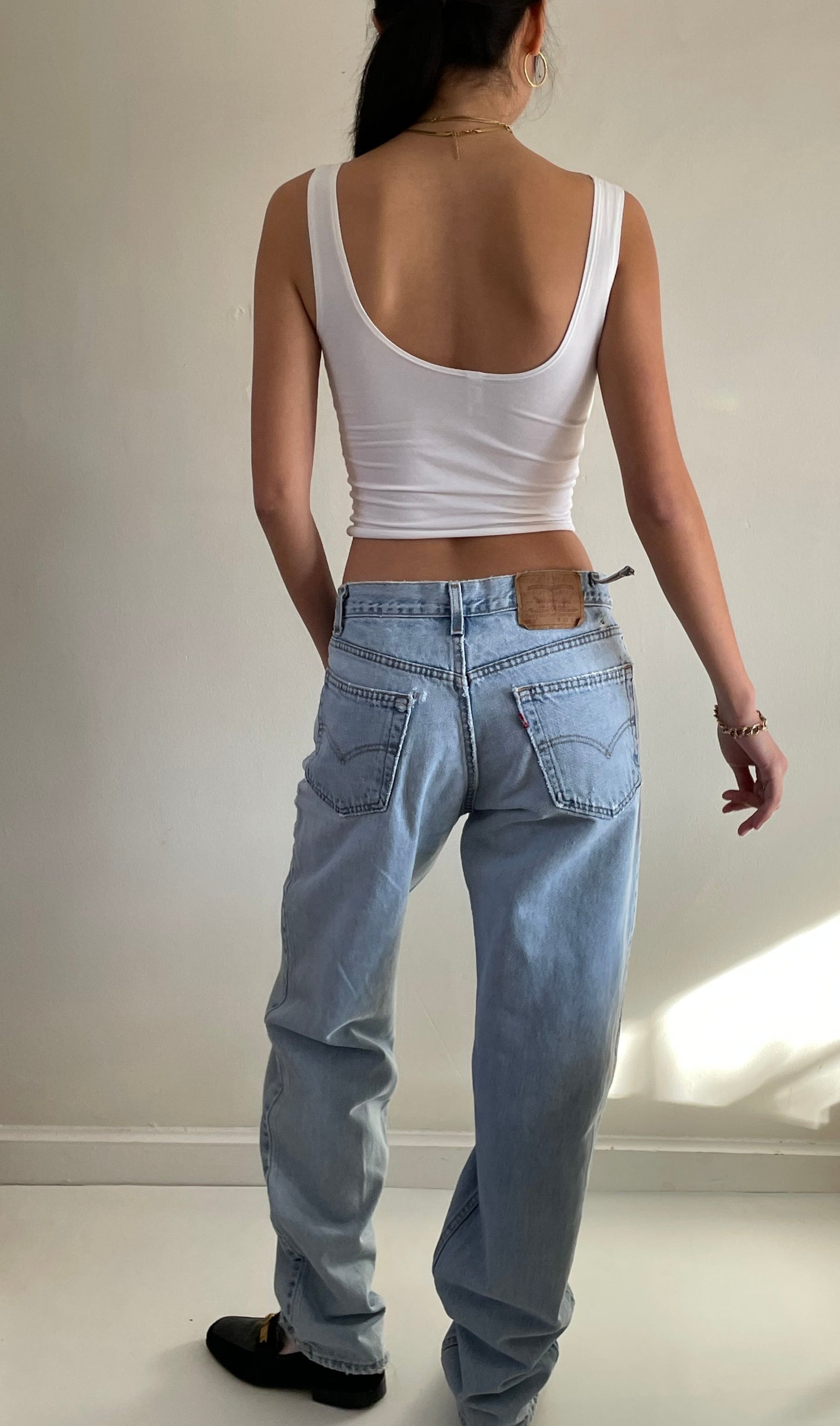 vintage Levi's 550 light wash high waisted zipper fly faded slouchy baggy Levis boyfriend jeans size 31