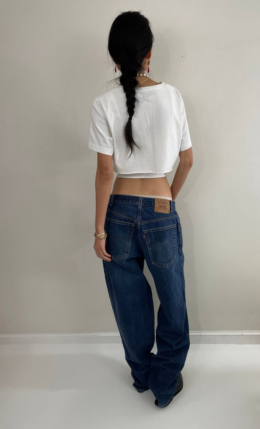 vintage Levi's 570 tall baggy fit zipper fly medium wash 90s barrel leg hip hop jeans size 32 x 35