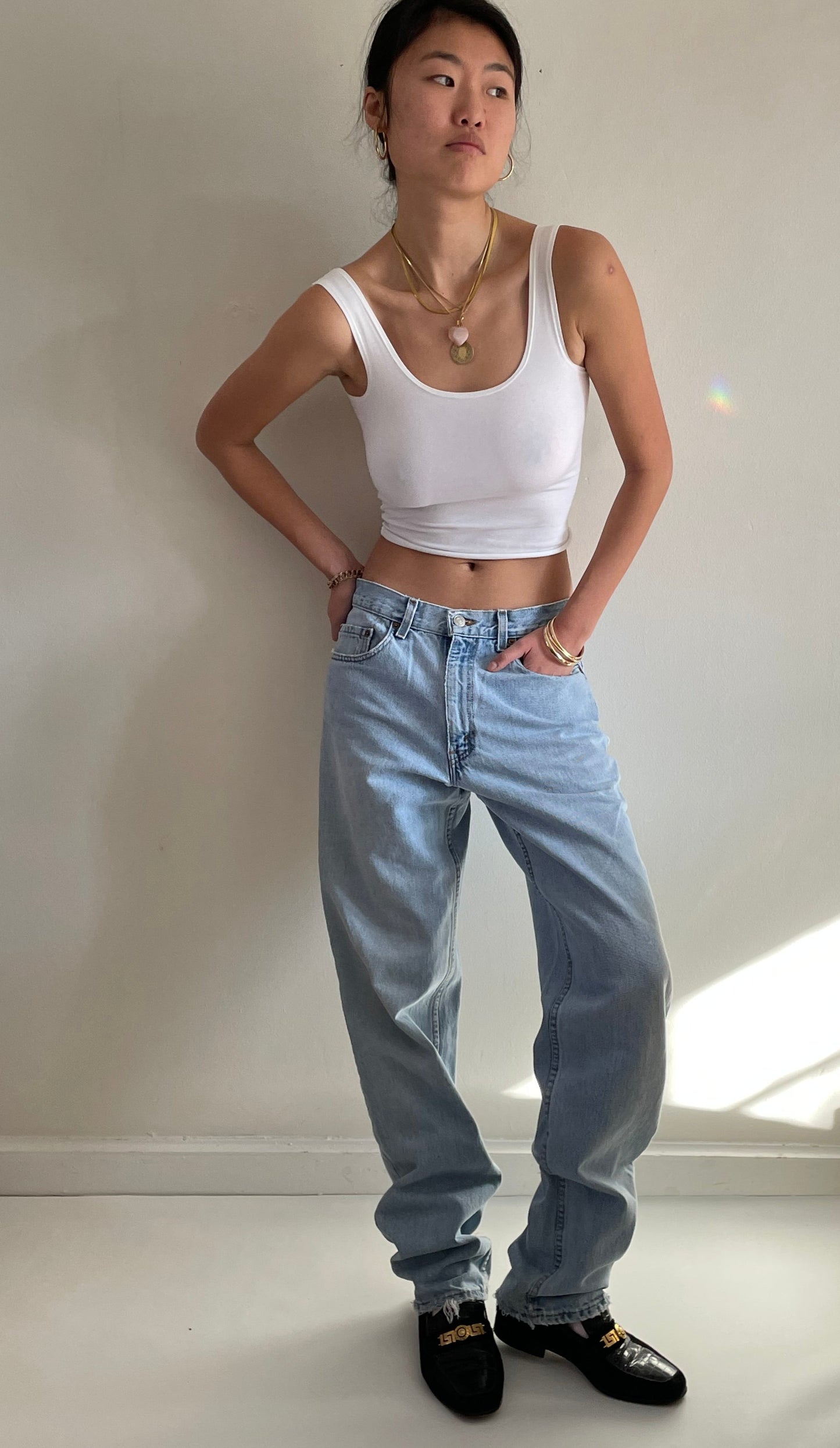 vintage Levi's 550 light wash high waisted zipper fly faded slouchy baggy Levis boyfriend jeans size 31