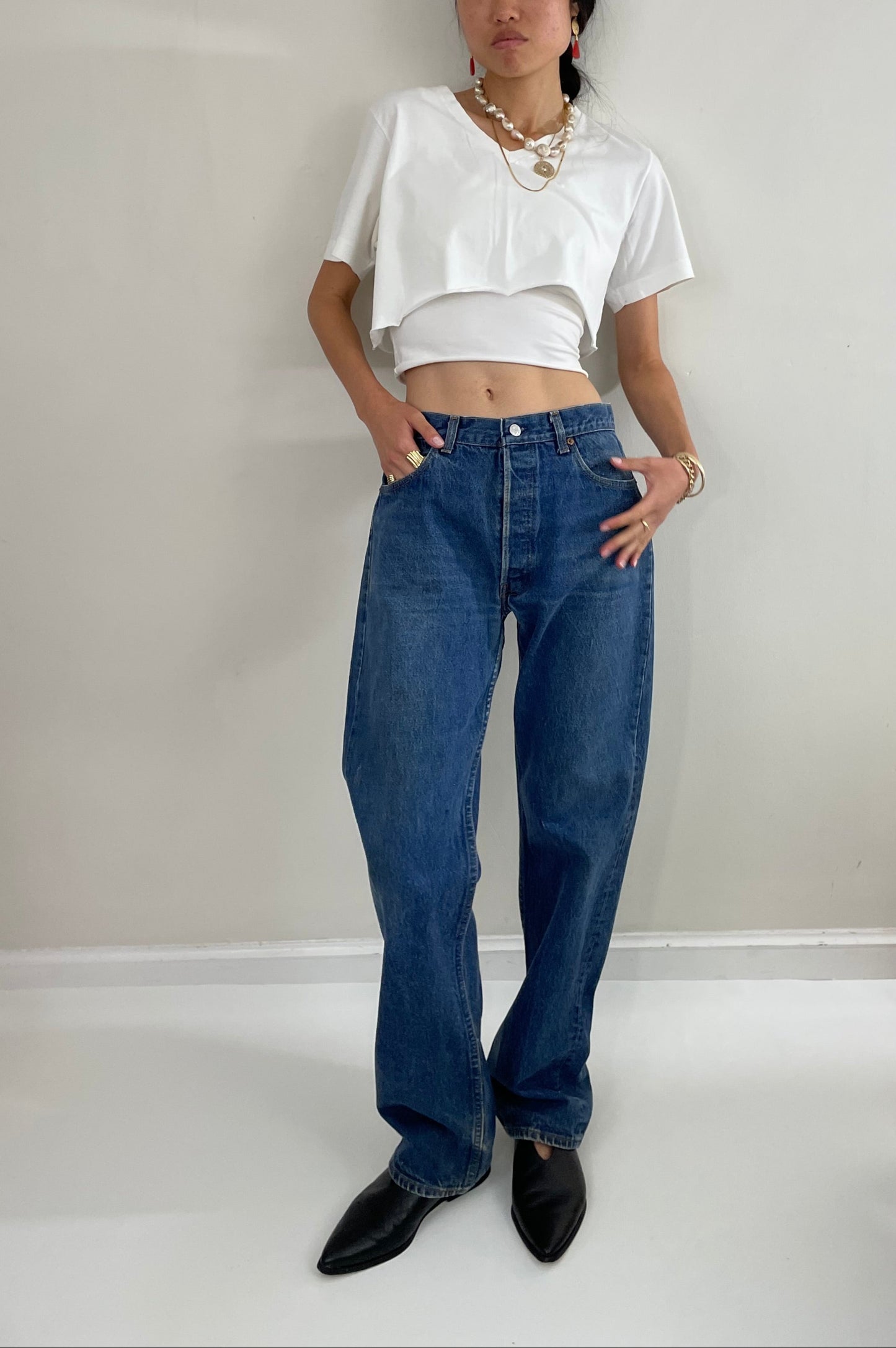 vintage Levi's 501 0115 medium wash button fly tall boyfriend jeans made in USA size 33 x 34