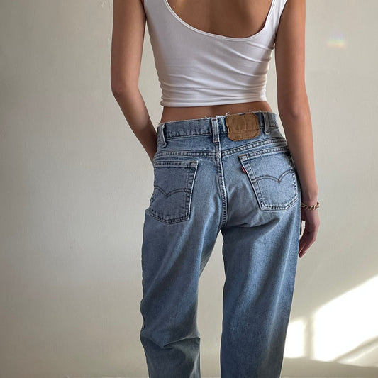 vintage Levis 560 frayed faded high waisted zipper fly Levi's jeans made in USA size 29