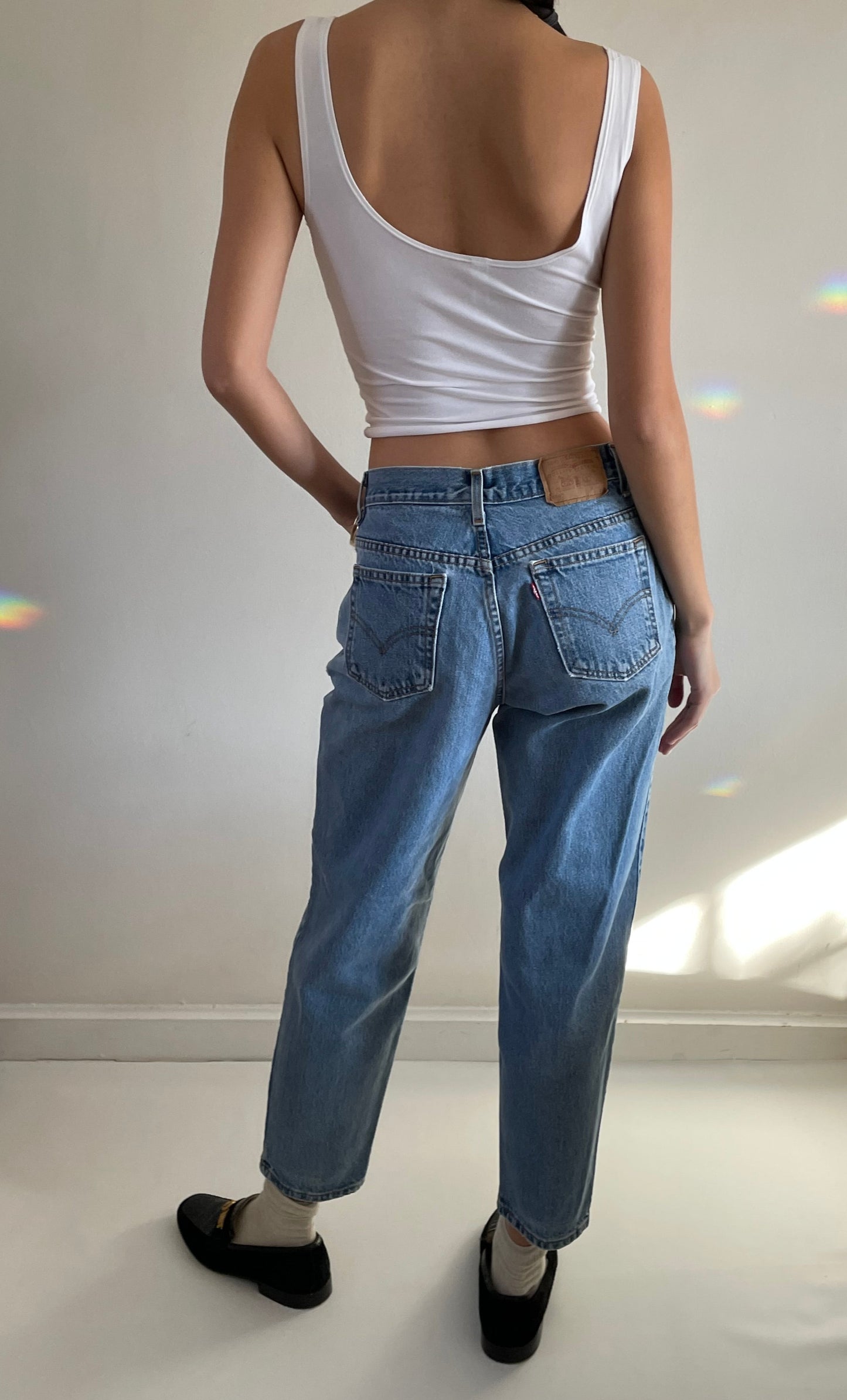 Vintage Levi's 550 high waisted faded light wash zipper Levis jeans made in USA size 29