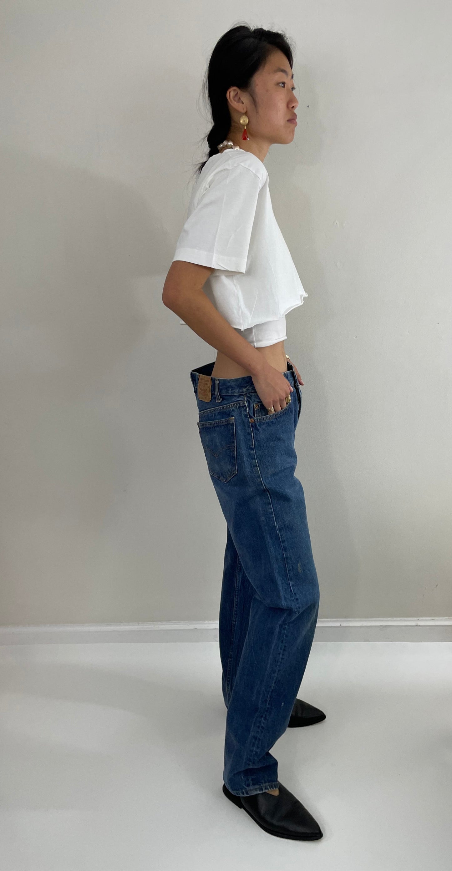 vintage Levi's 501 0115 medium wash button fly tall boyfriend jeans made in USA size 33 x 34