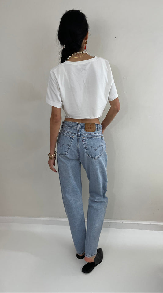 Vintage Levi's faded soft boyfriend relaxed fit high waisted zipper fly red tab light wash Levis 550 Dad jeans made in USA size Waist 31 x 33