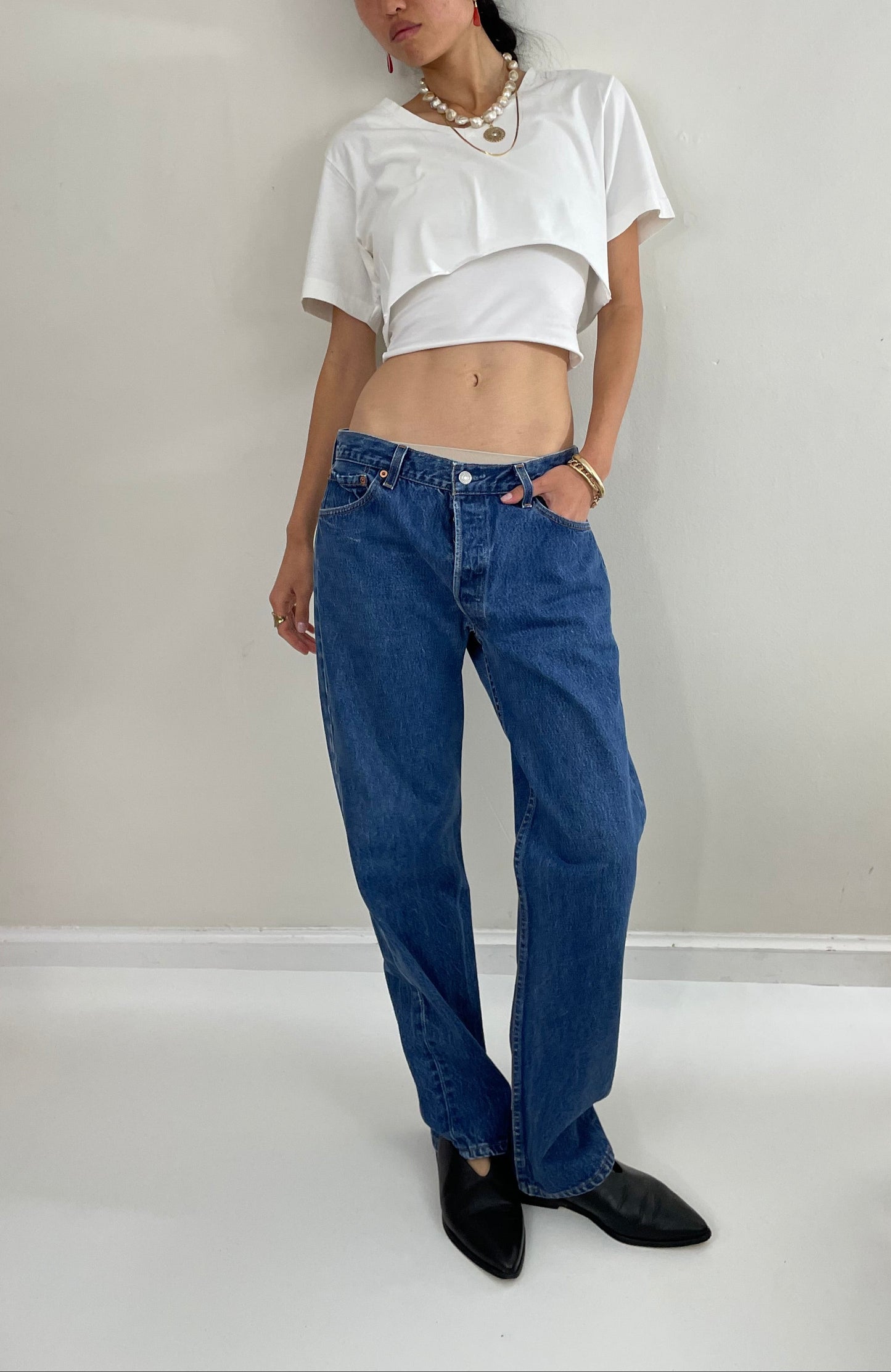 vintage 80s Levi's 501 faded button fly medium wash red tab Levis iconic jeans made in USA size 32 x 30